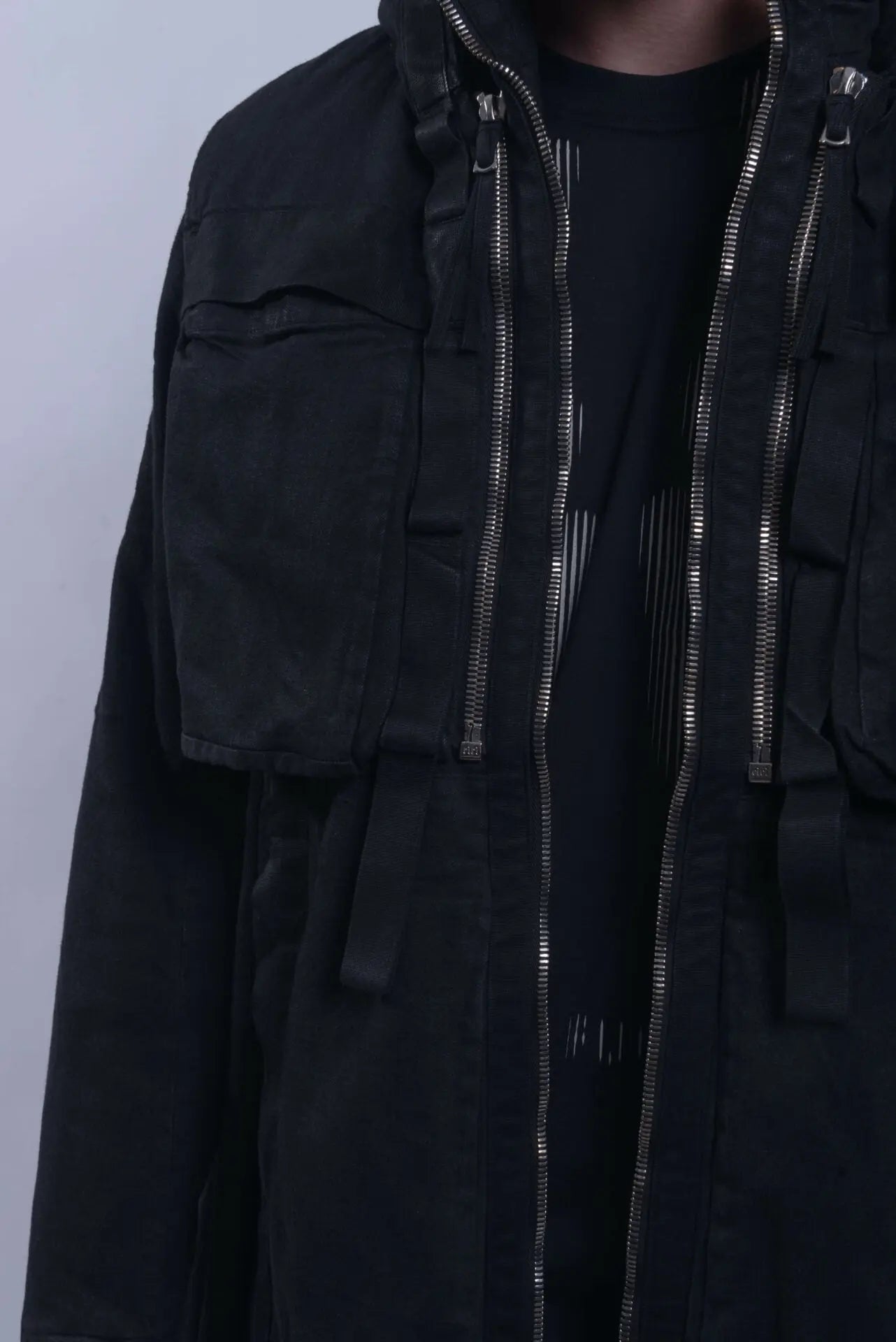 Boris Bidjan Saberi, 11 by BBS, Mens Parka Coat, Black, Nickel-Pressed, Vynyl Coated, Nickel Details, Full-Zip, Pockets, Removable Vest, Long Sleeves, Thumbholes, Zip Pockets, Side Pockets, Bellow Pockets, Chest Pockets, Hooded, Front Zippers and Pockets Close-up. 