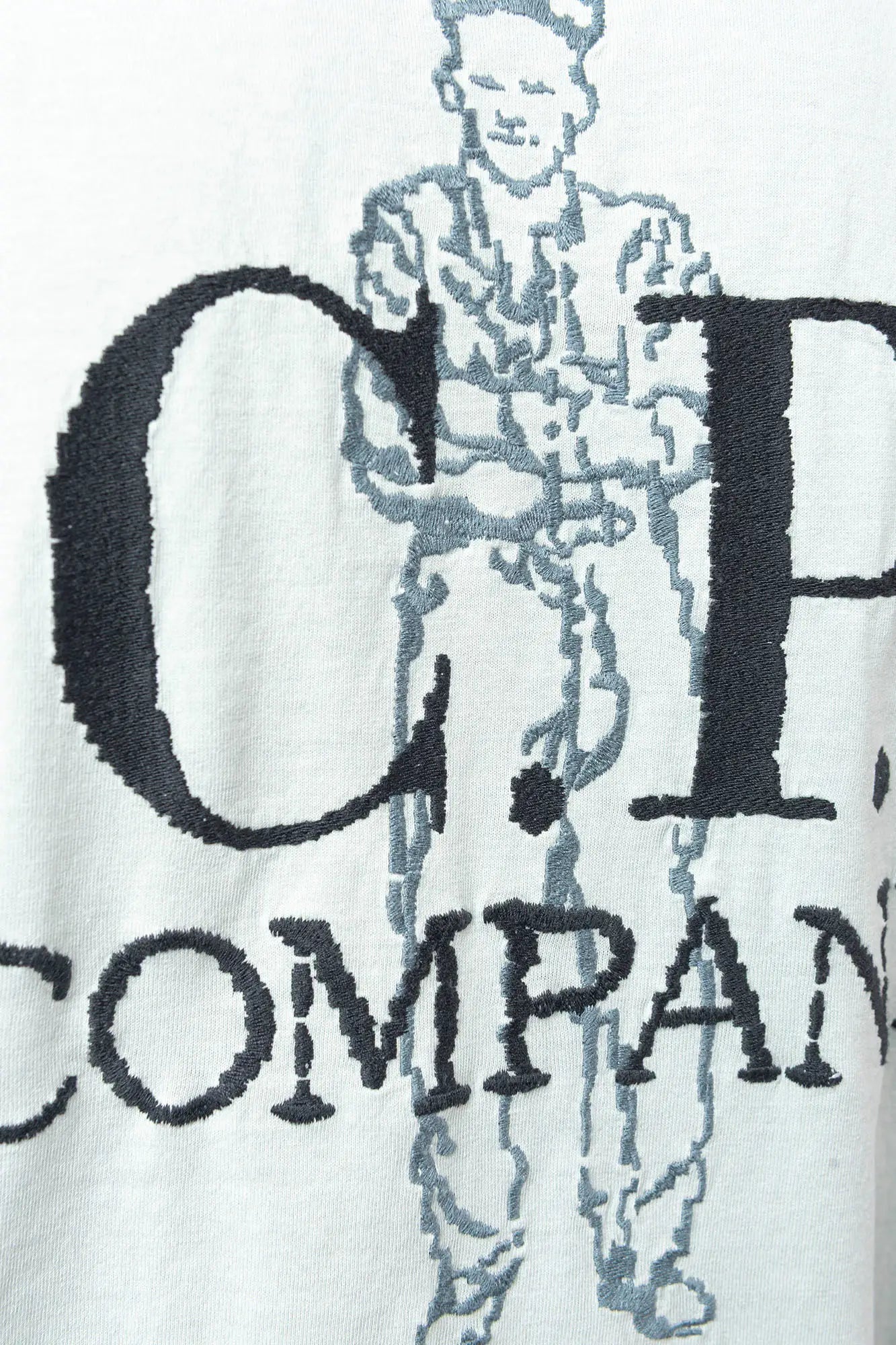 C.P. Company, Mens T-Shirt, Misty Blue 804, Light Blue, Garment Dyed, Chest and Back Embroidery, Short Sleeves, 100% Organic Cotton, Ribbed Hems and Neck, Crew Neck, Chester Perry, Massimo Osti, Back Embroidery Close-up. 