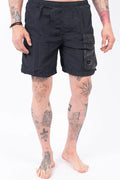 C.P. Company, Mens Swim Shorts, Black 999, Swimwear, Cargo Pockets, Elasticated Waistband, Quick-Dry Fabric, Polyamide, CP Company Signature Lens, Drawstring, Flatt Nylon, Wide Fit, Breathable, Front Portrait. 