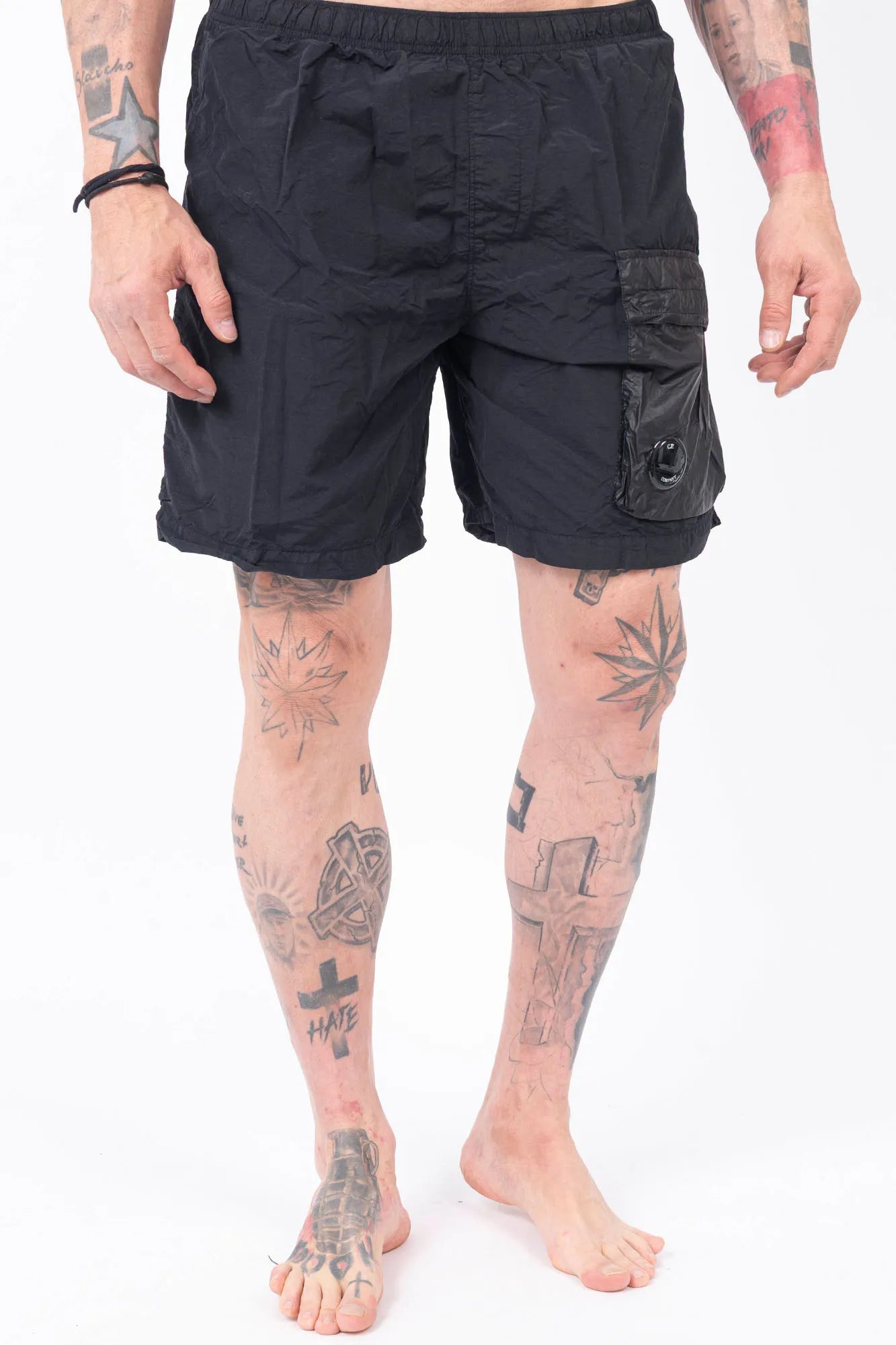 C.P. Company, Mens Swim Shorts, Black 999, Swimwear, Cargo Pockets, Elasticated Waistband, Quick-Dry Fabric, Polyamide, CP Company Signature Lens, Drawstring, Flatt Nylon, Wide Fit, Breathable, Front Portrait. 