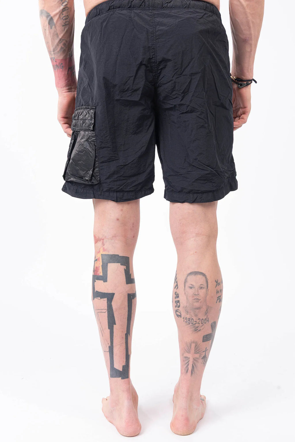 C.P. Company, Mens Swim Shorts, Black 999, Swimwear, Cargo Pockets, Elasticated Waistband, Quick-Dry Fabric, Polyamide, CP Company Signature Lens, Drawstring, Flatt Nylon, Wide Fit, Breathable, Back Portrait. 
