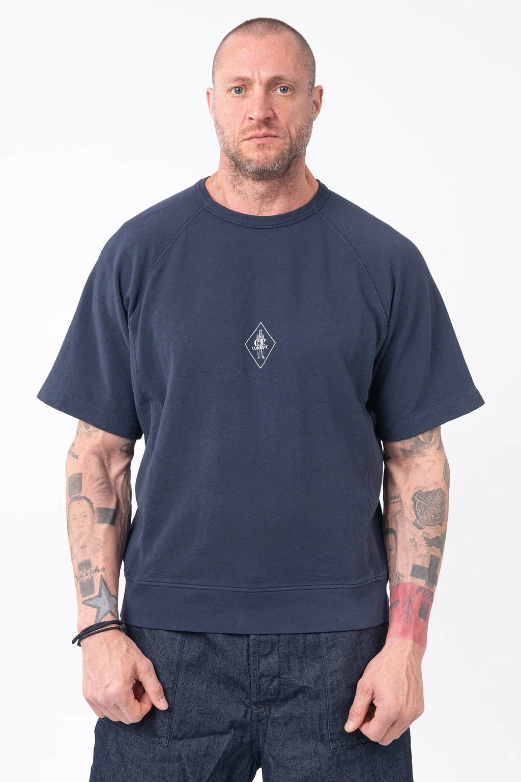 C.P. Company, Mens T-Shirt, Midnight Blue 889, Chest Printed Logo, British Saylor, White Print, Shor Sleeves, Ribbed Hem and Neck, 100% Organic Cotton, Massimo Osti, Chester Perry, Front Portrait. 