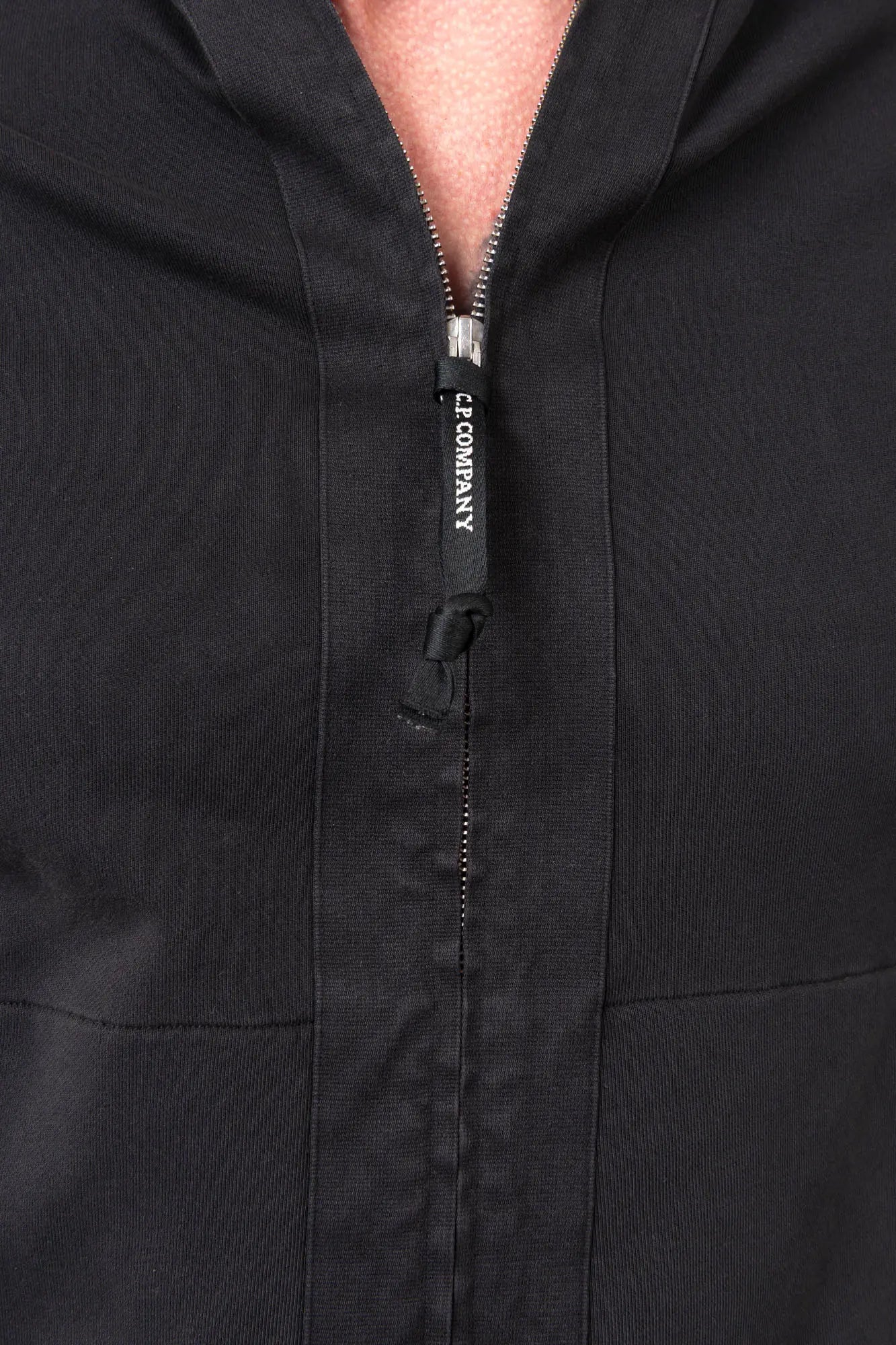 C.P. Company, Mens Sweatshirt, Black 999, Full-Zip, Lens Sleeve Pocket, Hooded, Side Pockets, Ribbed and Cuffs, Cord Adjustable Hem, Snap Closure Sleeve Pocket, Signature C.P. Company Lens Detail, Chester Perry, British Saylor, Massimo Osti, Garment Dyeing Techniques, Zip Closure Showcase. 