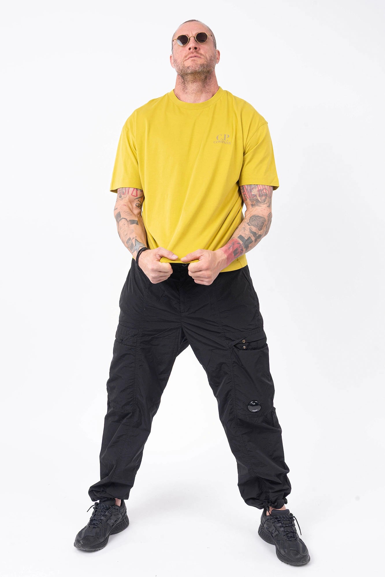 C.P. Company, Mens T-Shirt, Black 999, Chest and Back Print, Short Sleeves, Ribbed Hems and Neck, Crew Neck, Grey logo print, Breathable, Massimo Osti, Chester Perry, British Saylor, Full Body Front View. 