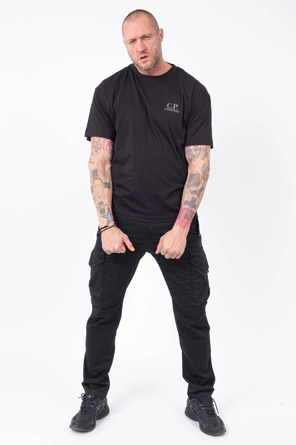 C.P. Company, Mens T-Shirt, Black 999, Chest and Back Print, Short Sleeves, Ribbed Hems and Neck, Crew Neck, Grey logo print, Breathable, Massimo Osti, Chester Perry, British Saylor, Full Body Front View. 