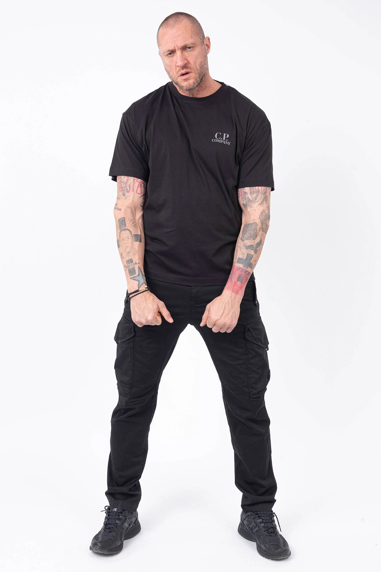 C.P. Company, Mens T-Shirt, Black 999, Chest and Back Print, Short Sleeves, Ribbed Hems and Neck, Crew Neck, Grey logo print, Breathable, Massimo Osti, Chester Perry, British Saylor, Full Body Front View. 