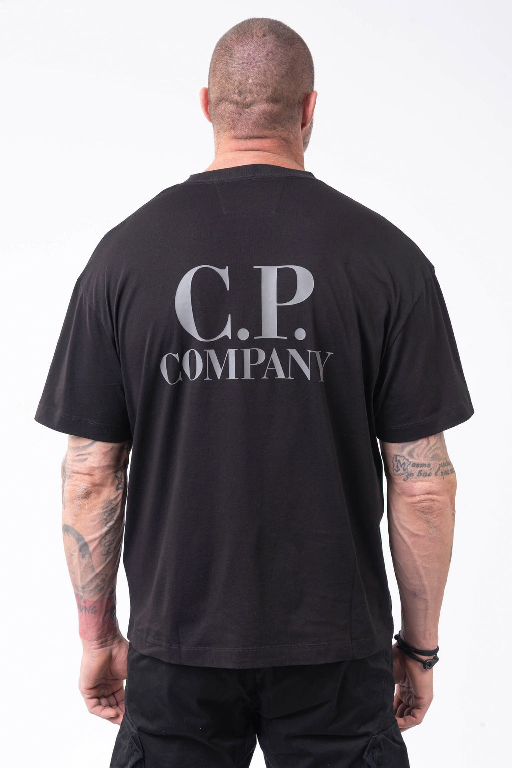 C.P. Company, Mens T-Shirt, Black 999, Chest and Back Print, Short Sleeves, Ribbed Hems and Neck, Crew Neck, Grey logo print, Breathable, Massimo Osti, Chester Perry, British Saylor, Back Portrait. 