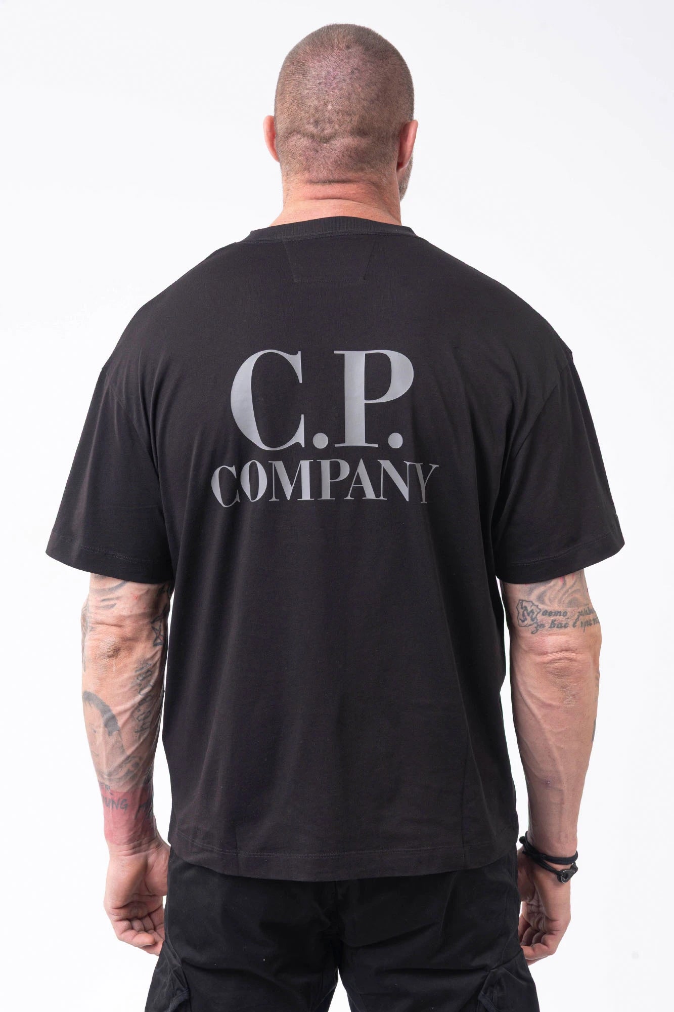 C.P. Company, Mens T-Shirt, Black 999, Chest and Back Print, Short Sleeves, Ribbed Hems and Neck, Crew Neck, Grey logo print, Breathable, Massimo Osti, Chester Perry, British Saylor, Back Portrait. 