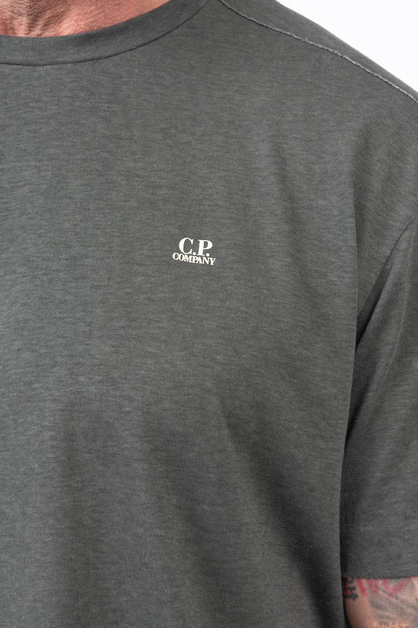 C.P. Company, Mens T-Shirt, Gunmetal 921, Grey, Gray, Short Sleeves, Ribbed Hems and Neck, Chest Logo Print, Organic Cotton, Garment Dyed, Chester Perry, Massimo Osti, Chest Print Close-up. 