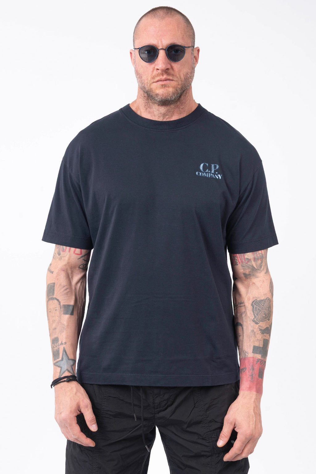 C.P. Company, Mens T-Shirt, Total Eclipse 888, Navy, Blue, Dark Blue, Chest and Back Print, X-Ray Color Print, Ribbed Hems and Neck, Crew Neck, Round Neck, Short Sleeves, Breathable, Chester Perry, Massimo Osti, Comfort Print Logo, Logo Print, Rigards Sunglasses, Front Portrait. 