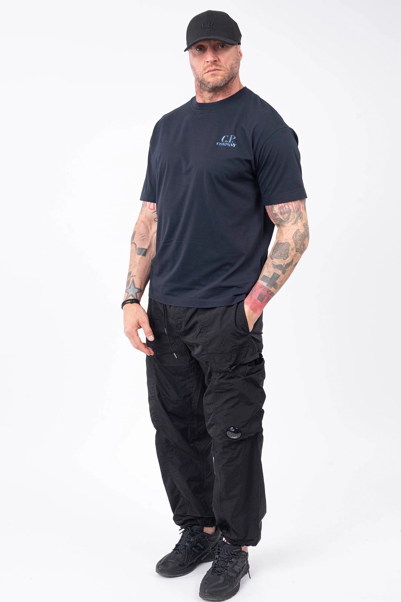 C.P. Company, Mens T-Shirt, Total Eclipse 888, Navy, Blue, Dark Blue, Chest and Back Print, X-Ray Color Print, Ribbed Hems and Neck, Crew Neck, Round Neck, Short Sleeves, Breathable, Chester Perry, Massimo Osti, Comfort Print Logo, Logo Print, Rigards Sunglasses, Full Body 3/4 View. 