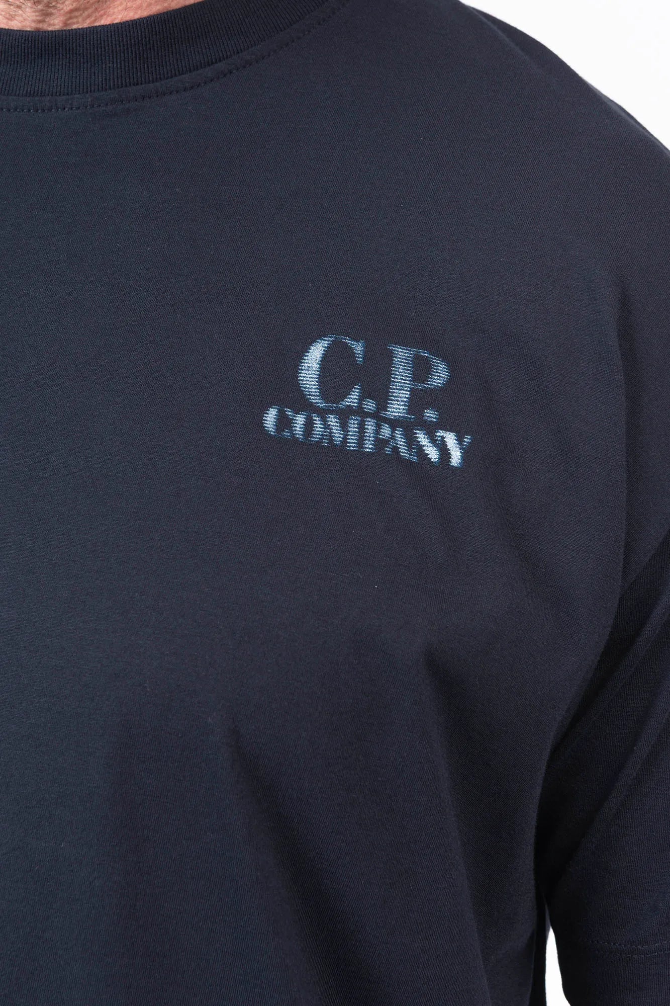 C.P. Company, Mens T-Shirt, Total Eclipse 888, Navy, Blue, Dark Blue, Chest and Back Print, X-Ray Color Print, Ribbed Hems and Neck, Crew Neck, Round Neck, Short Sleeves, Breathable, Chester Perry, Massimo Osti, Comfort Print Logo, Logo Print, Rigards Sunglasses, Chest Print Close-up. 