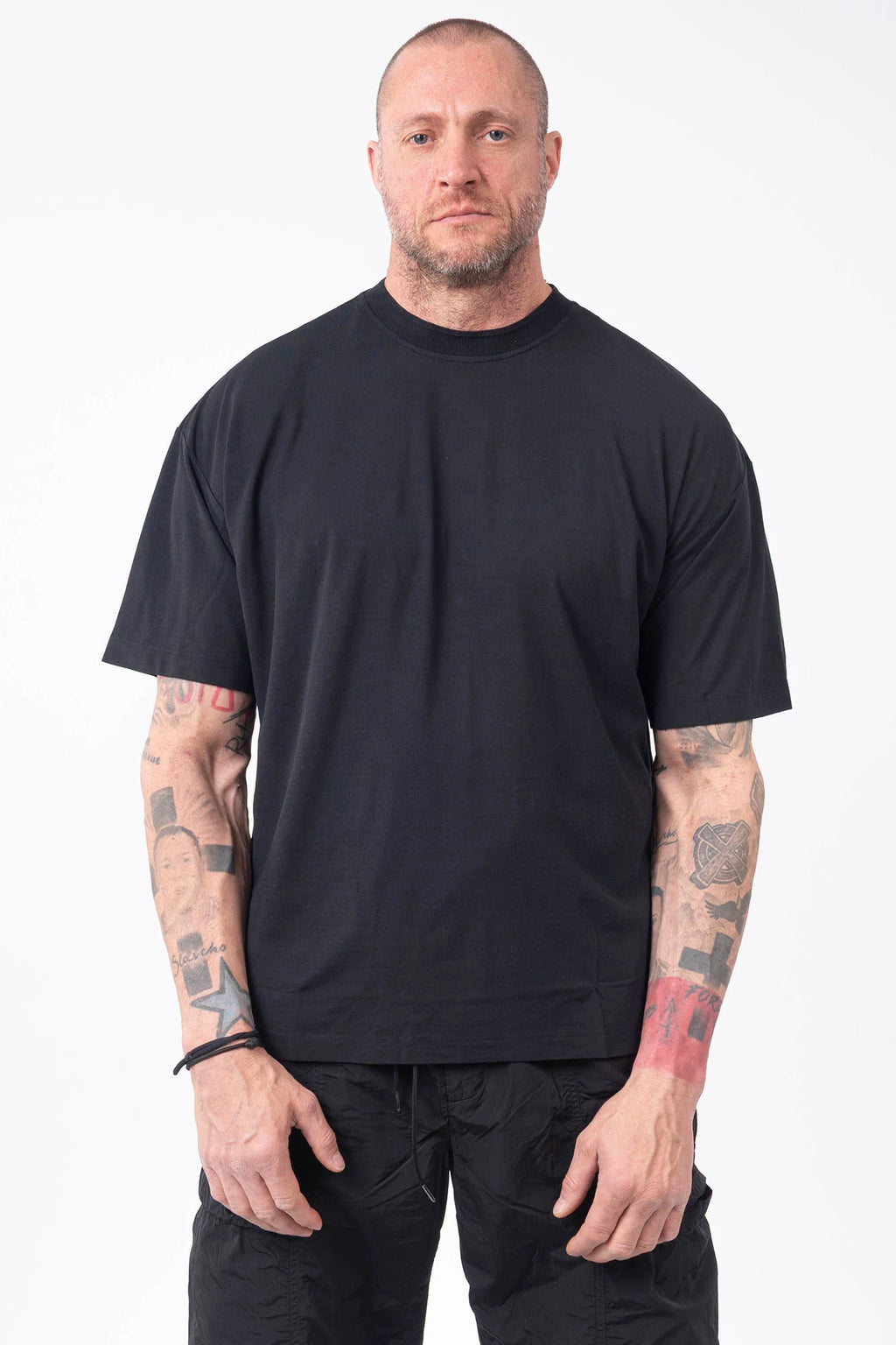 C.P. Company, Mens T-Shirt, Black, Organic Cotton, One Color, Crew Neck, Round Neck, 100% Cotton, Ribbed Neckline and Sleeve Ends, Chester Perry, Massimo Osti, Made in Italy, Front Portrait. 