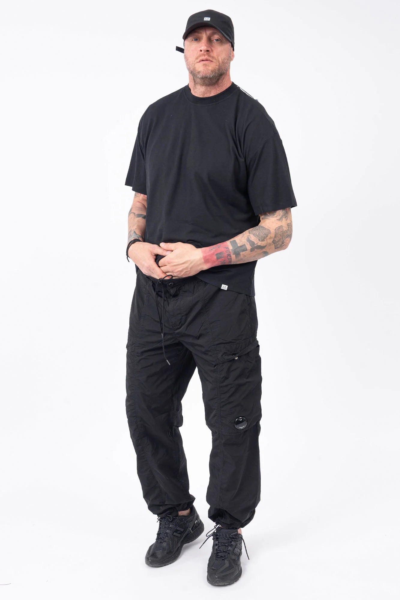 C.P. Company, Mens T-Shirt, Black, Organic Cotton, One Color, Crew Neck, Round Neck, 100% Cotton, Ribbed Neckline and Sleeve Ends, Chester Perry, Massimo Osti, Made in Italy, Full Body Front View. 