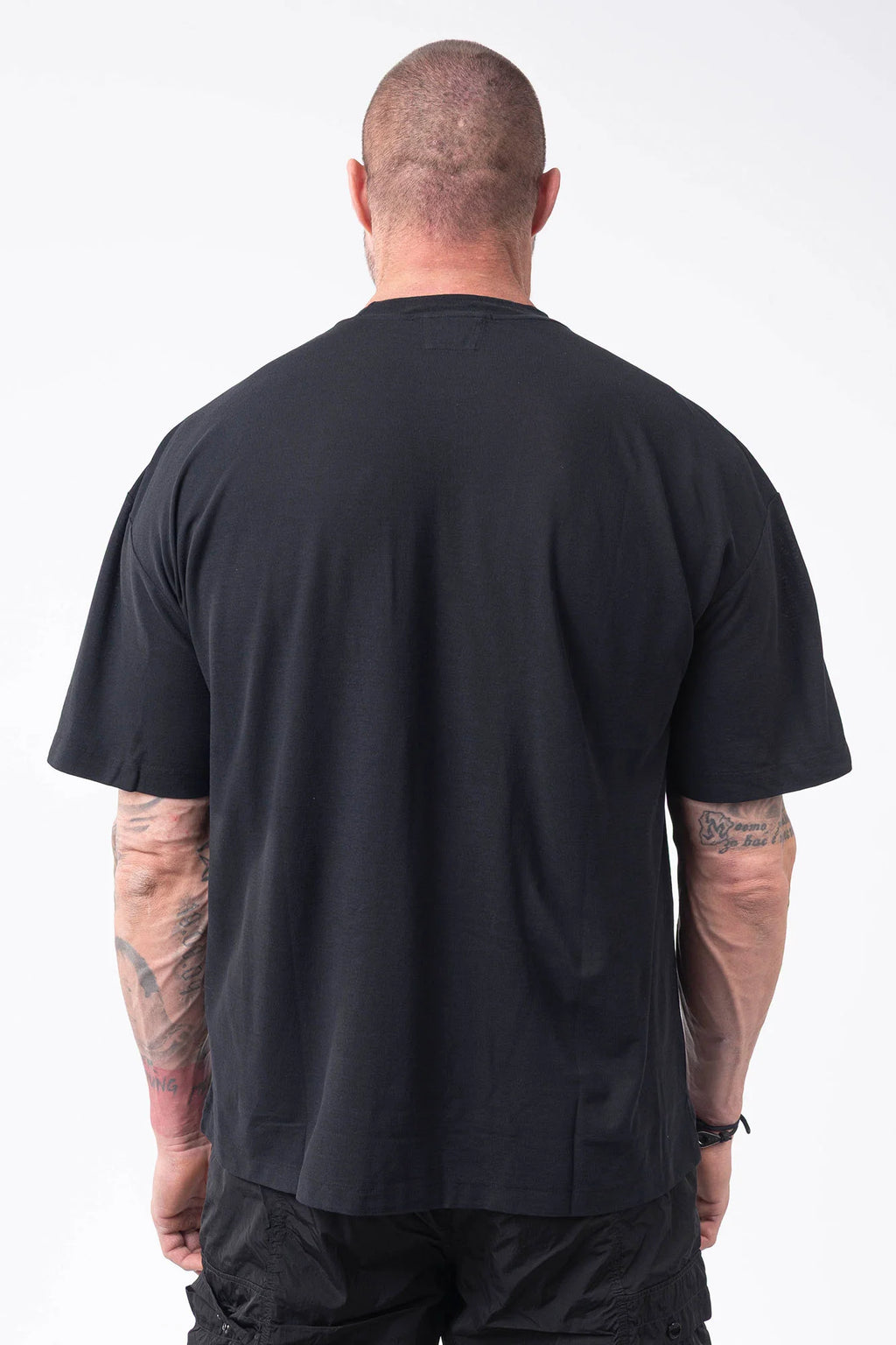 C.P. Company, Mens T-Shirt, Black, Organic Cotton, One Color, Crew Neck, Round Neck, 100% Cotton, Ribbed Neckline and Sleeve Ends, Chester Perry, Massimo Osti, Made in Italy, Back Portrait. 