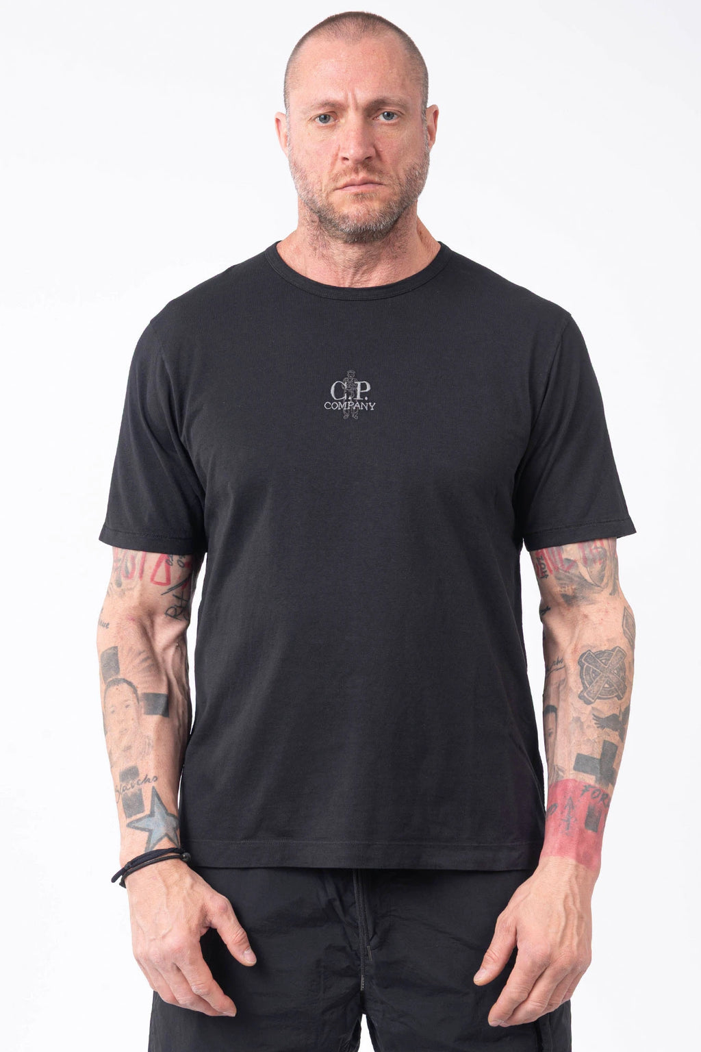 C.P. Company, Mens T-Shirt, Black 999, Logo Embroidery, British Sailor, Back Embroidery, Grey Stitching, Short Sleeves, 100% Organic Cotton, Ribbed Hem and Neck, Standard Fit, Front Portrait. 