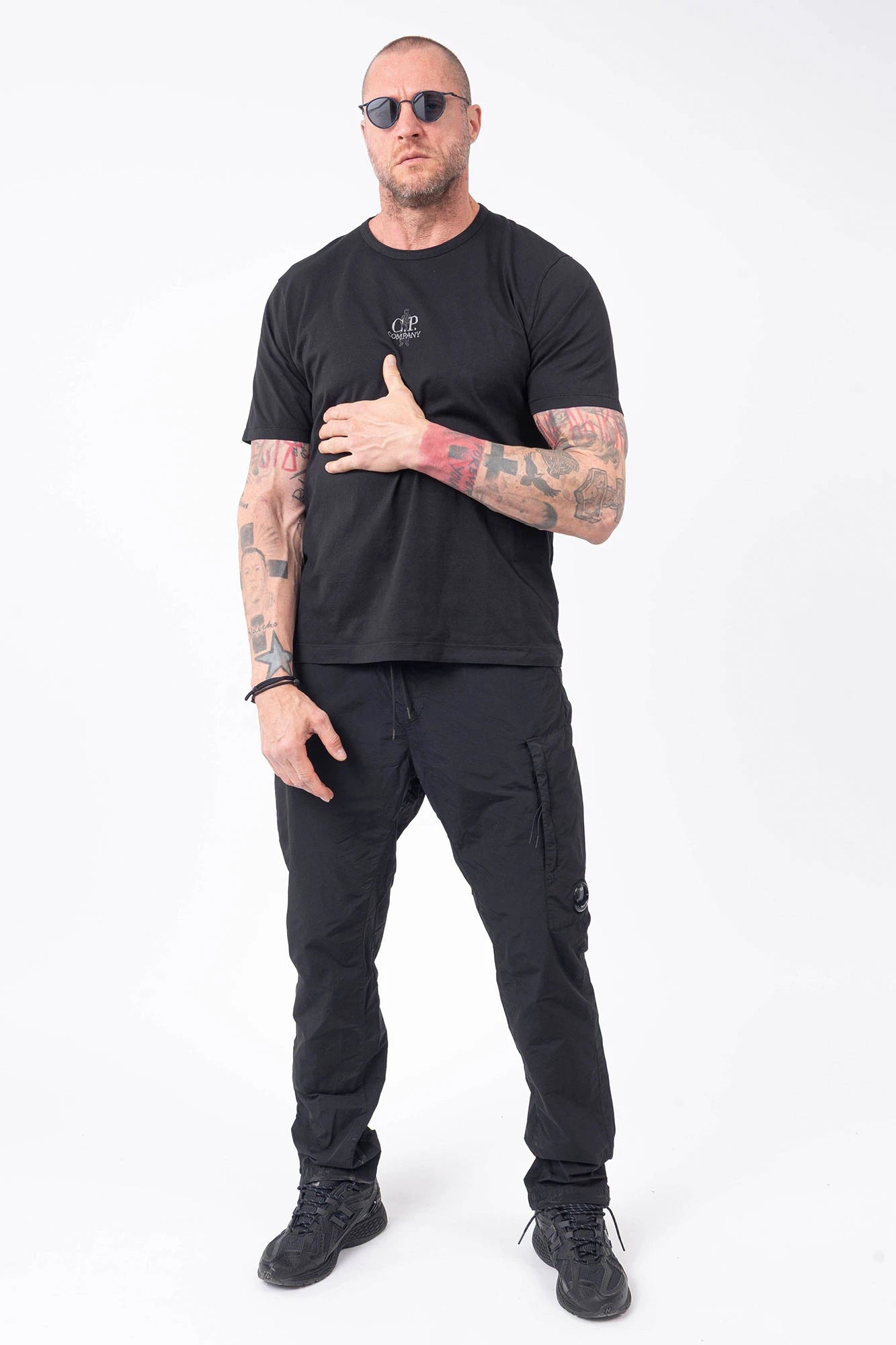 C.P. Company, Mens T-Shirt, Black 999, Logo Embroidery, British Sailor, Back Embroidery, Grey Stitching, Short Sleeves, 100% Organic Cotton, Ribbed Hem and Neck, Standard Fit, Full Body Front View. 