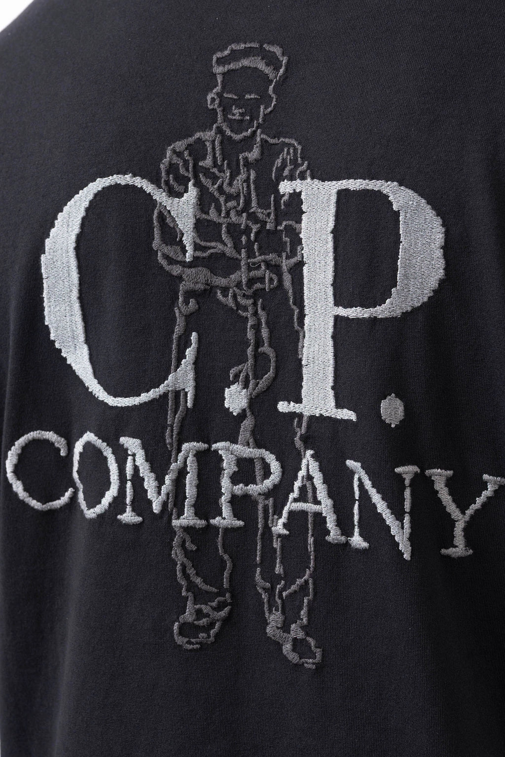 C.P. Company, Mens T-Shirt, Black 999, Logo Embroidery, British Sailor, Back Embroidery, Grey Stitching, Short Sleeves, 100% Organic Cotton, Ribbed Hem and Neck, Standard Fit, Back Embroidery Close-up. 