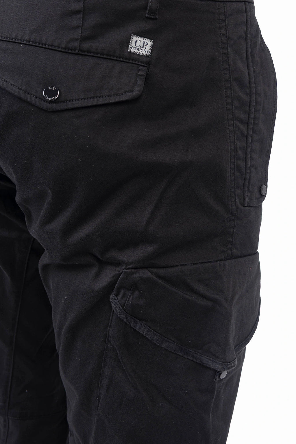 C.P. Company, Mens Cargo Pants, Black 999, Stretch Cotton Satin, Elastic, Cargo Pockets, Side Pockets, Belt Loops, Button Closure, Zip-Fly, Lens Pocket Detail, Massimo Osti, Chester Perry, British Saylor, Back Pocket Close-up. 