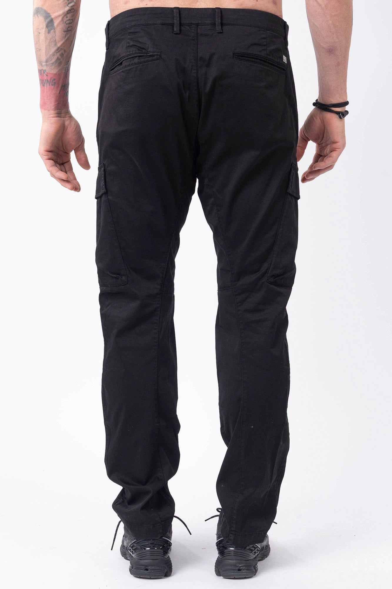 C.P. Company, Mens Pants, Black 999, Side Pockets, Cargo Flap Pockets, Lens Pocket Detail, Belt Loops, Button Closure, Zip-fly, Back Pockets, Stretch Cotton Sateen, Massimo Osti, Chester Perry, British Saylor, Back Portrait. 