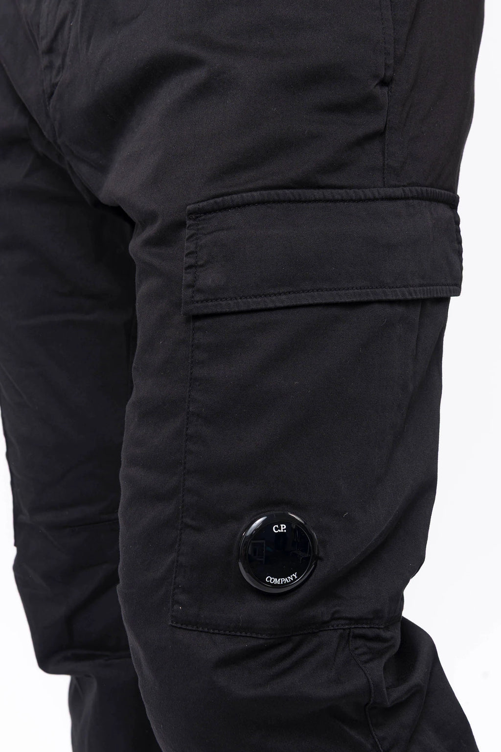 C.P. Company, Mens Pants, Black 999, Side Pockets, Cargo Flap Pockets, Lens Pocket Detail, Belt Loops, Button Closure, Zip-fly, Back Pockets, Stretch Cotton Sateen, Massimo Osti, Chester Perry, British Saylor, Cargo Pocket Close-up. 