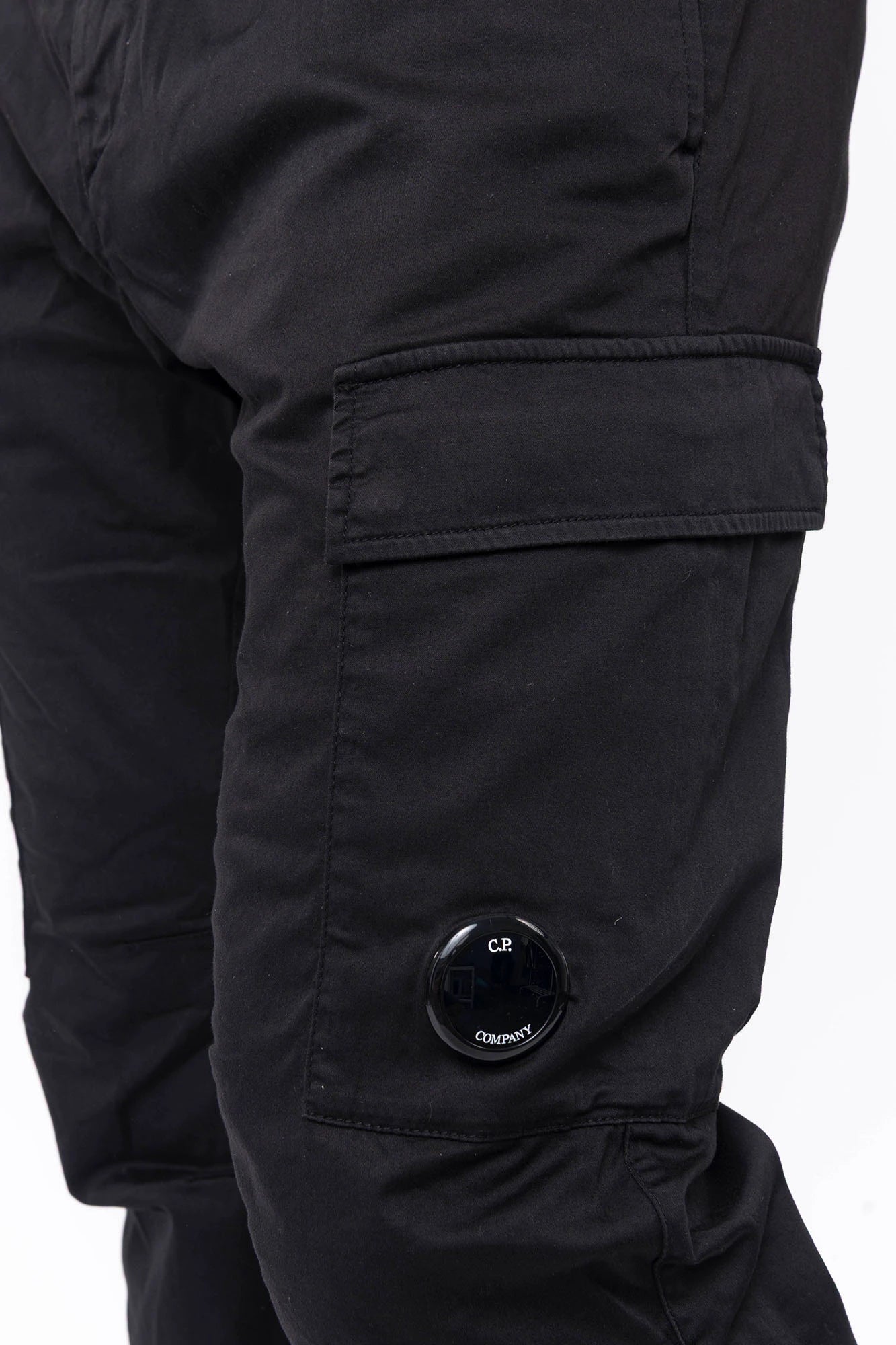 C.P. Company, Mens Pants, Black 999, Side Pockets, Cargo Flap Pockets, Lens Pocket Detail, Belt Loops, Button Closure, Zip-fly, Back Pockets, Stretch Cotton Sateen, Massimo Osti, Chester Perry, British Saylor, Cargo Pocket Close-up. 