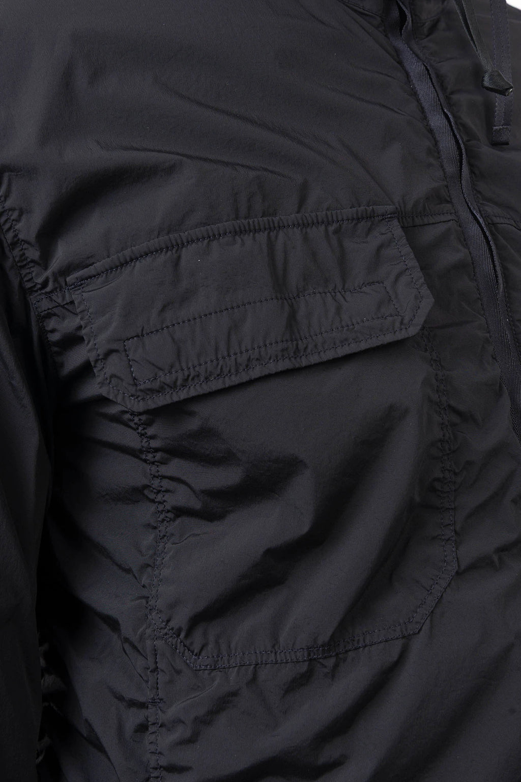 C.P. Company, Mens Jacket, Black 999, Stretch Nylon, Shell-R, Nycra-R, Hooded, Water-Resistant, Wind-Resistant, Windproof, Waterproof, Full-Zip, Centre Zip Closure, Bellow Pockets, Side Pockets, Sleeve Pocket, Massimo Osti, Chester Perry, Chest Pockets Showcase. 