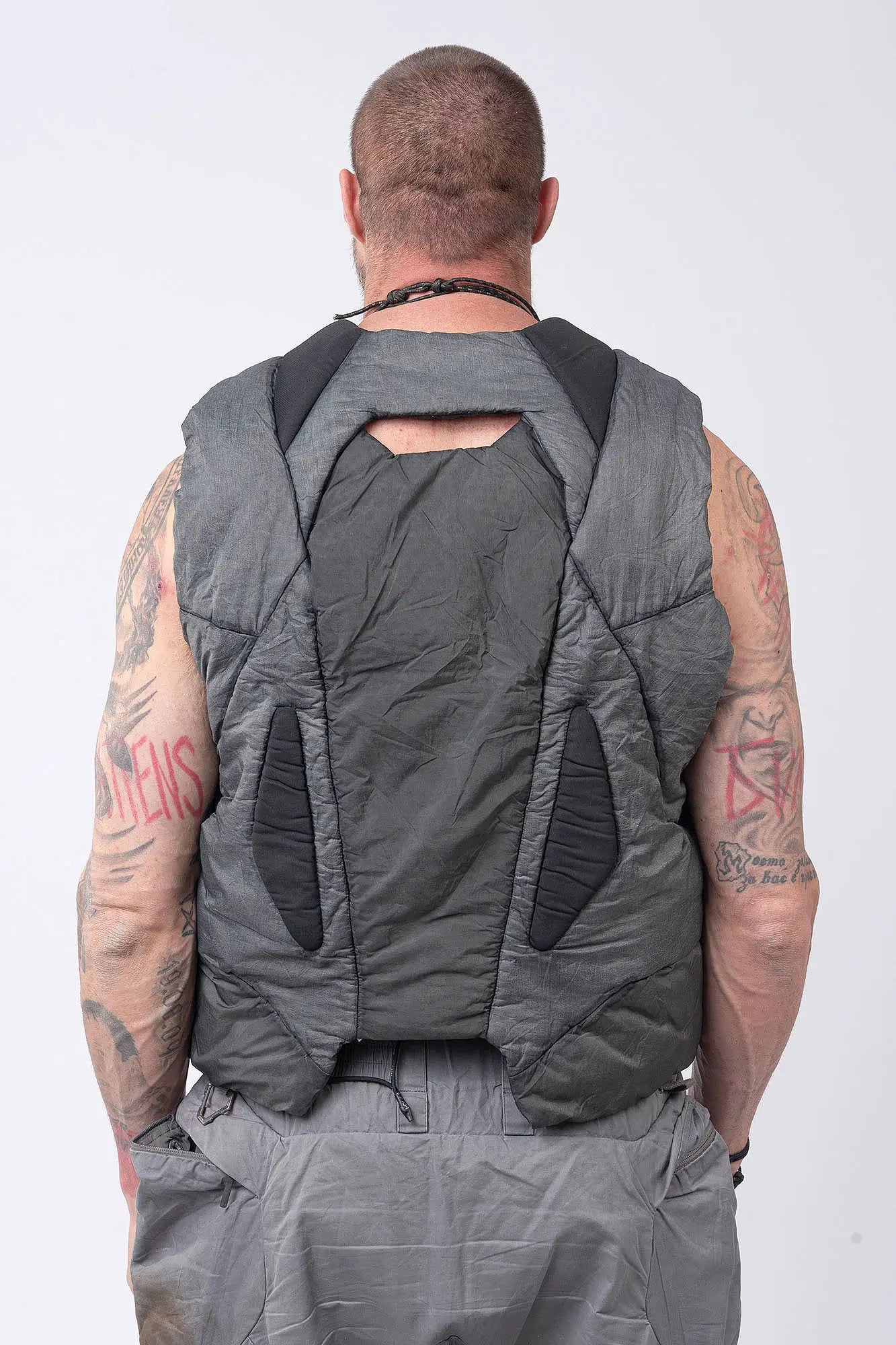 Hamcus, Mens Vest, Washed Grey, Sleeveless, Padded, Full-Zip, Multiple Zip Pockets, Breathable Design, Elastic Drawcord Adjustable Waist, Back Ventilation Cutoff, Centre Zip Closure, Full Zip, Garment Dyed, Insulated, Panel Construction, Back Portrait. 