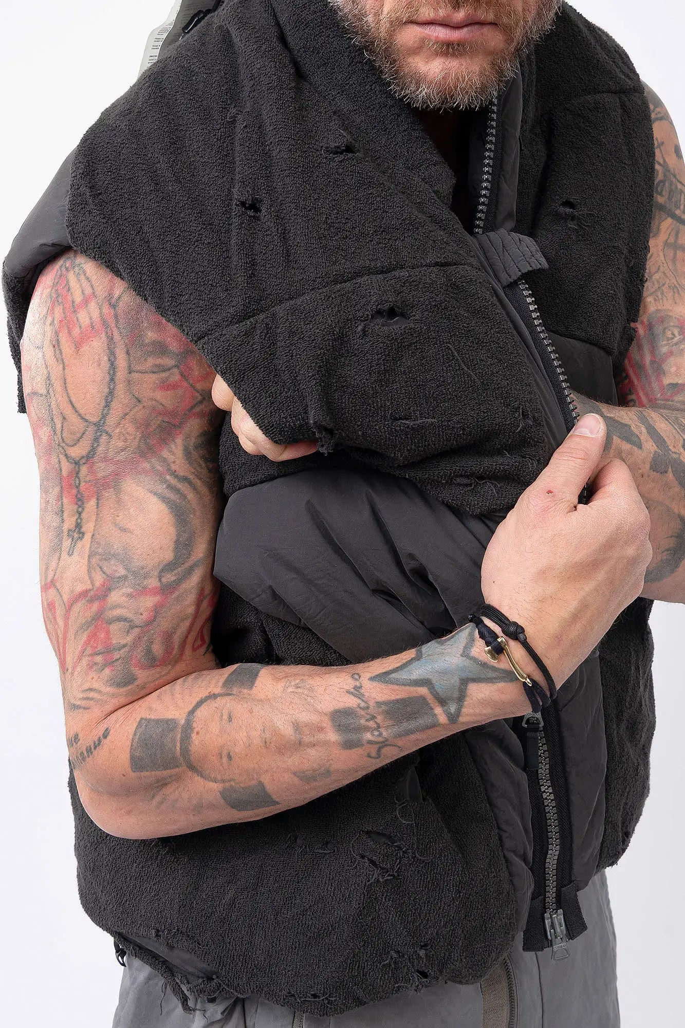 Hamcus, Mens Vest, Matte Black, Multi-Fabric Blend, Panel Construction, Patchwork Design, Heavy-Duty Vislon Zipper, Worn Appearance, Functional Pockets, Hidden Pockets, Breathable, Back LP World Print, Front Worn-Look Close-up Showcase. 