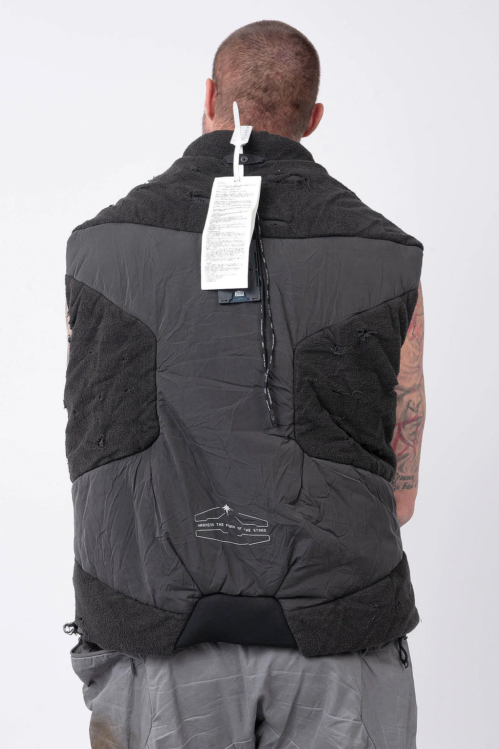 Hamcus, Mens Vest, Matte Black, Multi-Fabric Blend, Panel Construction, Patchwork Design, Heavy-Duty Vislon Zipper, Worn Appearance, Functional Pockets, Hidden Pockets, Breathable, Back LP World Print, Back Portrait. 