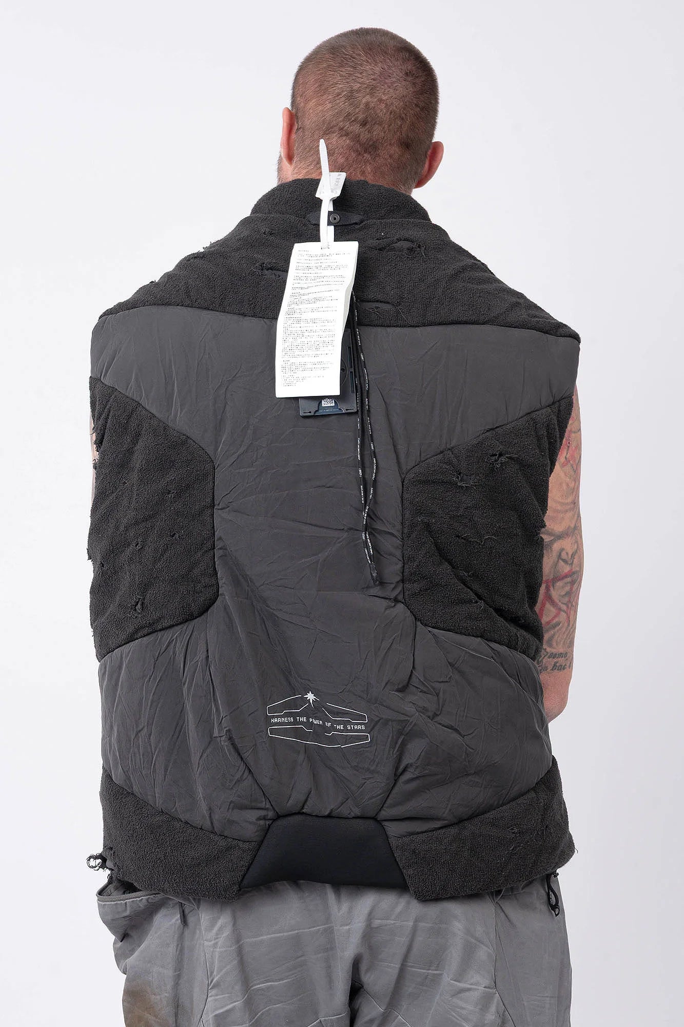 Hamcus, Mens Vest, Matte Black, Multi-Fabric Blend, Panel Construction, Patchwork Design, Heavy-Duty Vislon Zipper, Worn Appearance, Functional Pockets, Hidden Pockets, Breathable, Back LP World Print, Back Portrait. 