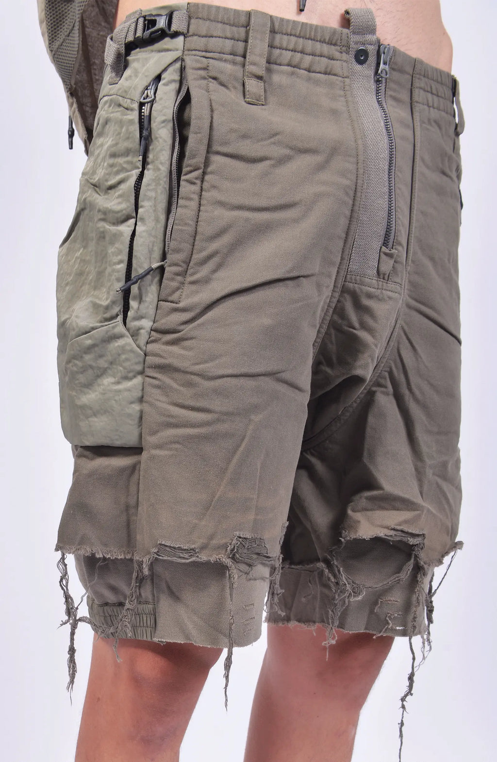 Hamcus, Mens Shorts, Beige, Agate Grey, Olive Green, Zip-Fly, Multiple Pockets, Cargo, Back Pockets, Belt Loops, Elastic Waistband, Raw Details, Short Pants, Unisex, Close-up Front 3/4 View. 