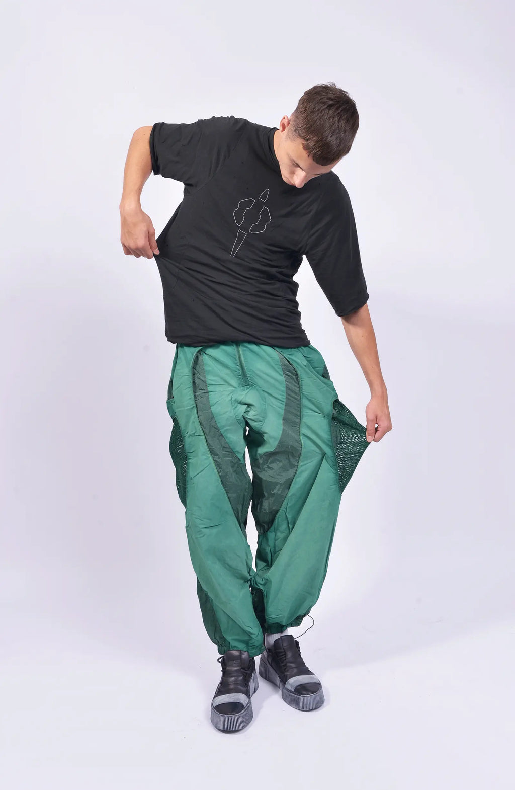Hamcus, Mens Pants, Green, Garment Dyed, Multi Fabric Panel Construction, Elasticated Waistband, Cord Adjustable, Buckles, Side Mesh Panels, Elasticated Cuffs, Adjustable Cuffs, Long Sleeves, Ventilated, Side Pockets, Zippers, Zip-Fly, Full Body Front View. 
