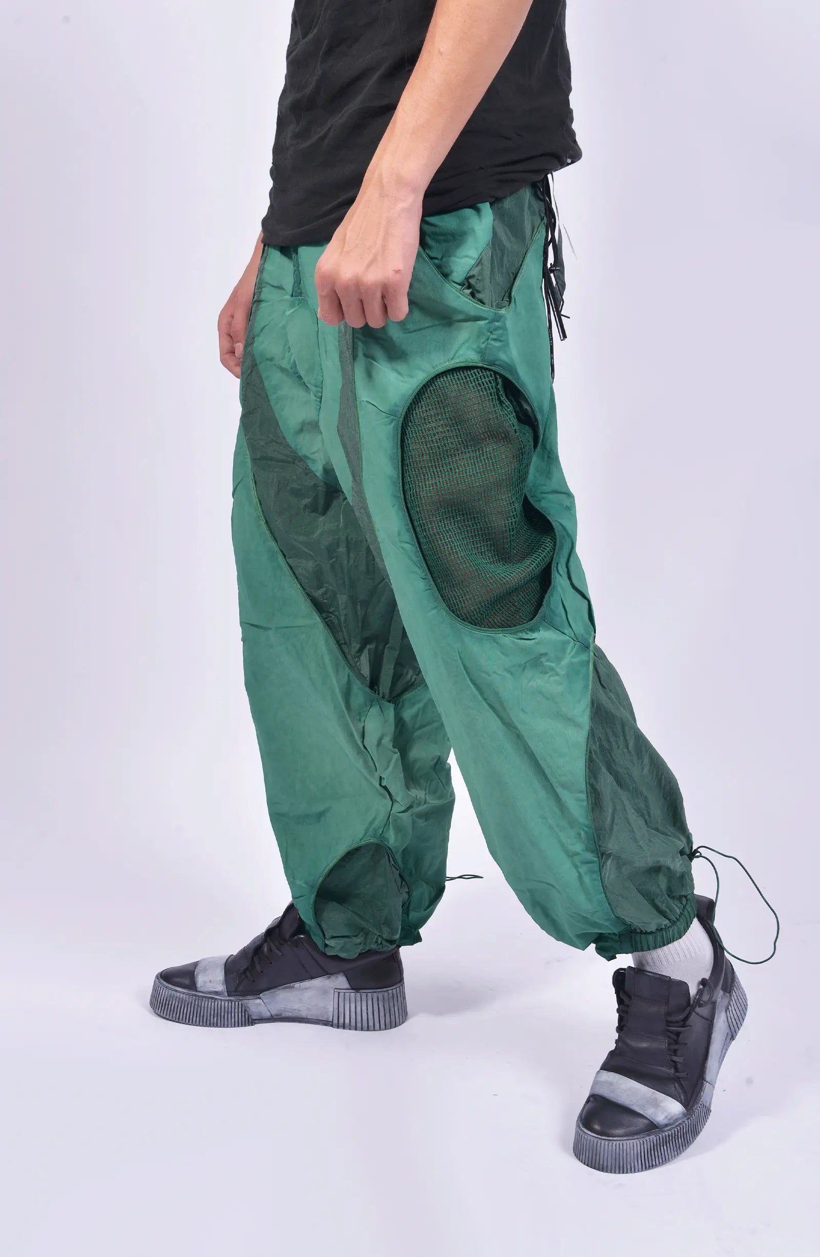 Hamcus, Mens Pants, Green, Garment Dyed, Multi Fabric Panel Construction, Elasticated Waistband, Cord Adjustable, Buckles, Side Mesh Panels, Elasticated Cuffs, Adjustable Cuffs, Long Sleeves, Ventilated, Side Pockets, Zippers, Zip-Fly, Front Portrait Side Step. 