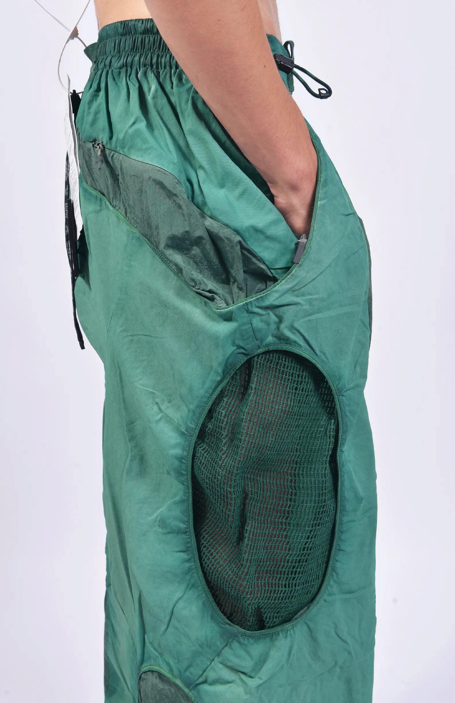 Hamcus, Mens Pants, Green, Garment Dyed, Multi Fabric Panel Construction, Elasticated Waistband, Cord Adjustable, Buckles, Side Mesh Panels, Elasticated Cuffs, Adjustable Cuffs, Long Sleeves, Ventilated, Side Pockets, Zippers, Zip-Fly, Side Mesh Ventilation. 