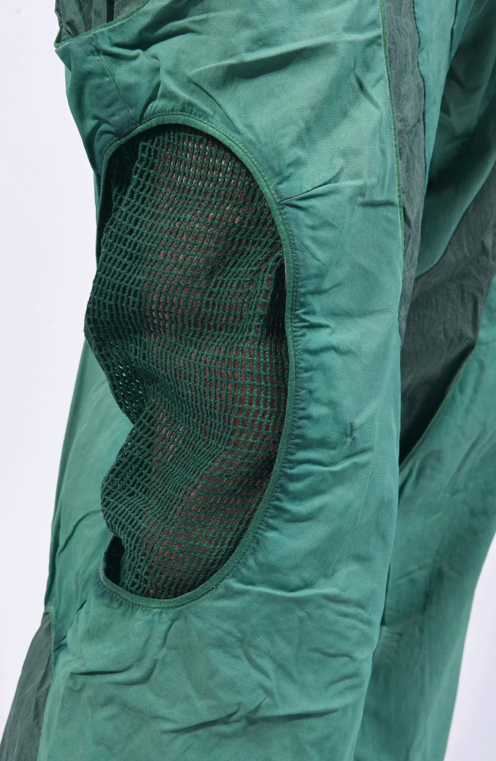 Hamcus, Mens Pants, Green, Garment Dyed, Multi Fabric Panel Construction, Elasticated Waistband, Cord Adjustable, Buckles, Side Mesh Panels, Elasticated Cuffs, Adjustable Cuffs, Long Sleeves, Ventilated, Side Pockets, Zippers, Zip-Fly, Mesh Ventilation Close-up Showcase. 