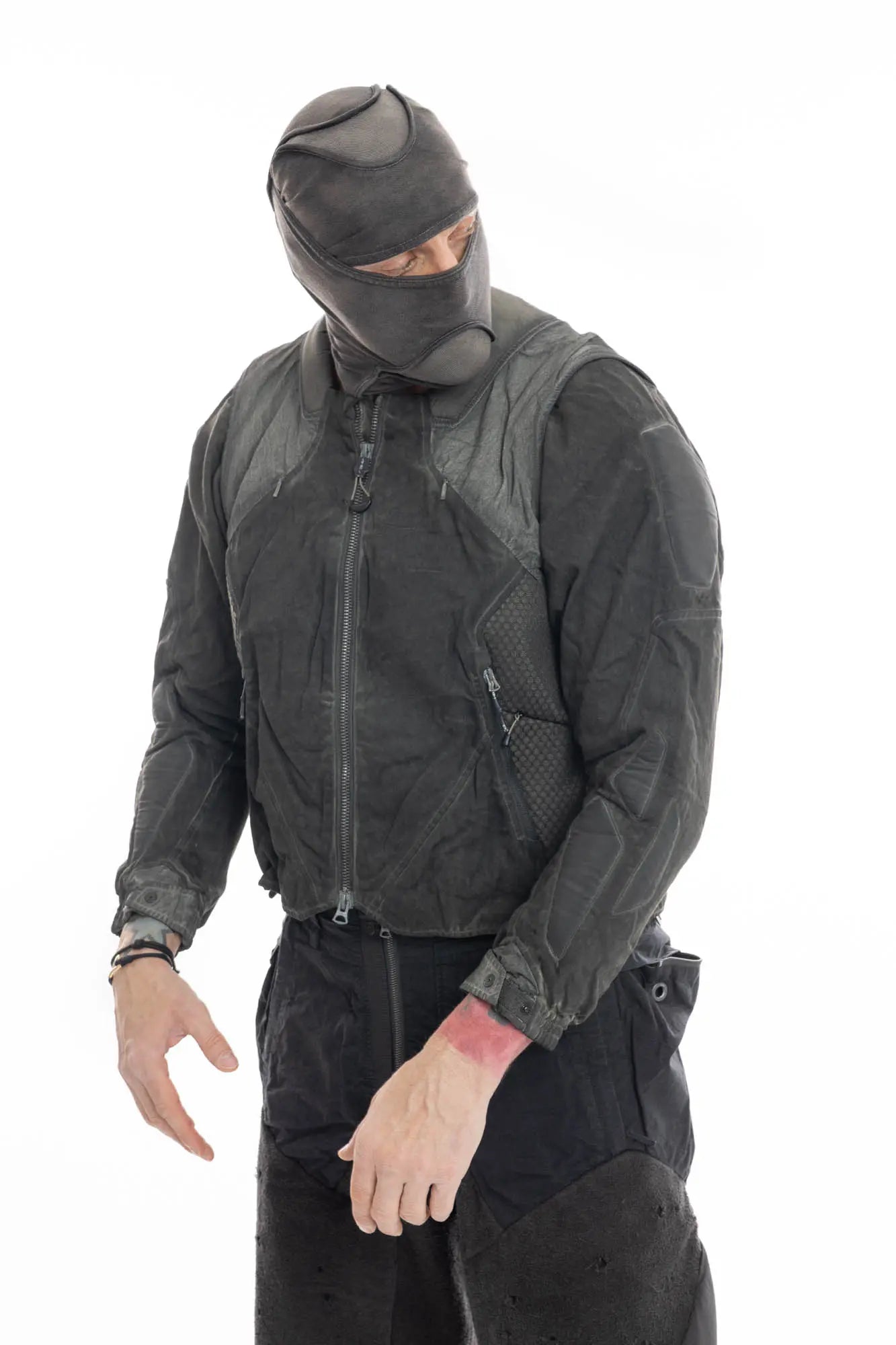 Hamcus, Mens Jacket, Dark Grey, Grey, Multicolor, Garment-Dyed, Detachable Sleeves, Adjustable Cuffs, Skimask, Module Construction, Wearable Sponge Panels, Side Zip Pockets, Multiple Zippers, Multiple Pockets, Front 3/4 Portrait. 