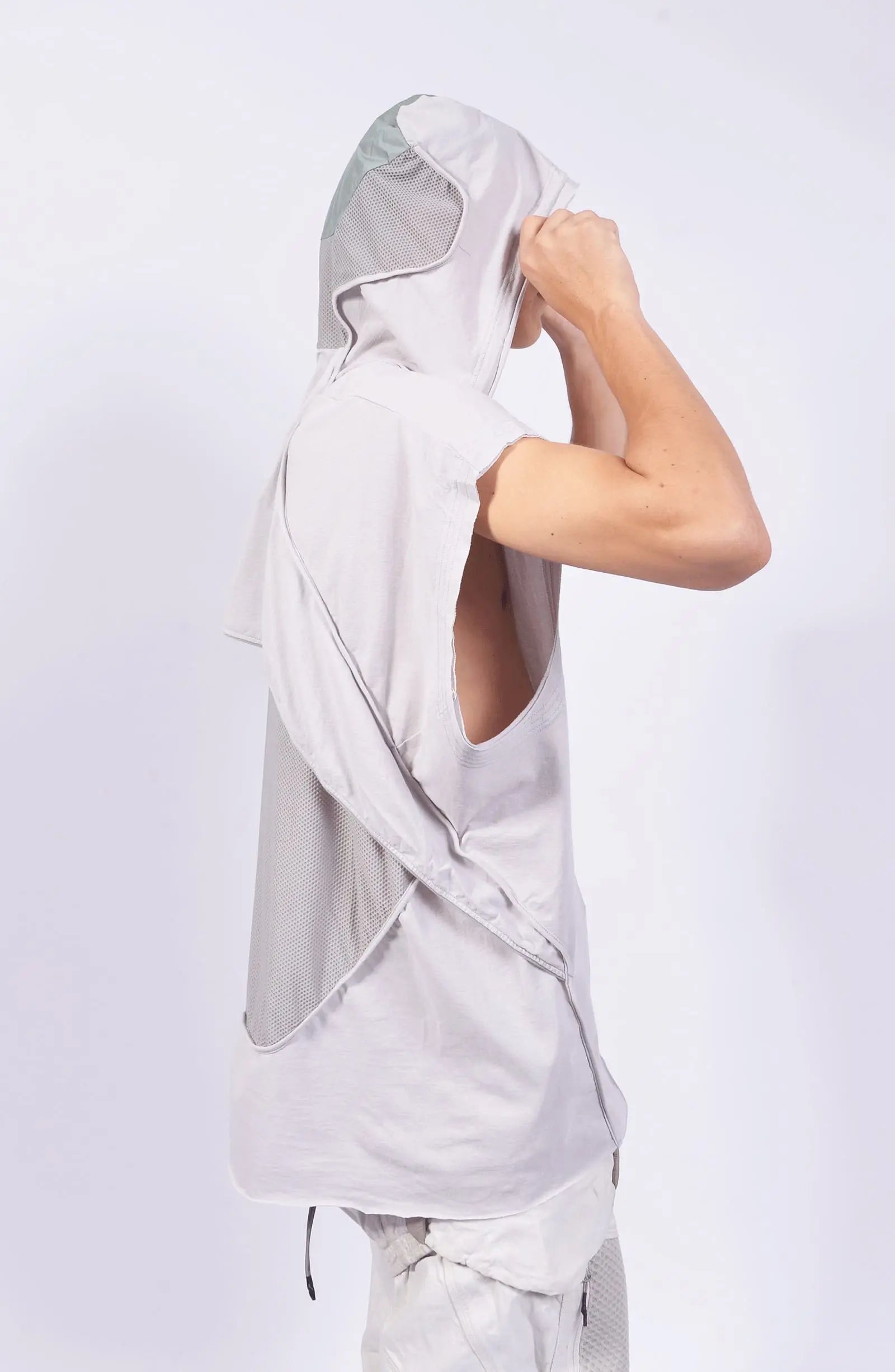 Hamcus, Mens Tank Top, Fiend Grey, Off-White, White, Drawcord Adjustable Hood, Parachute Cord, Sleeveless, Panel Construction, Back Breathability Mesh Design, Dropped Shoulders, Hooded Side View. 
