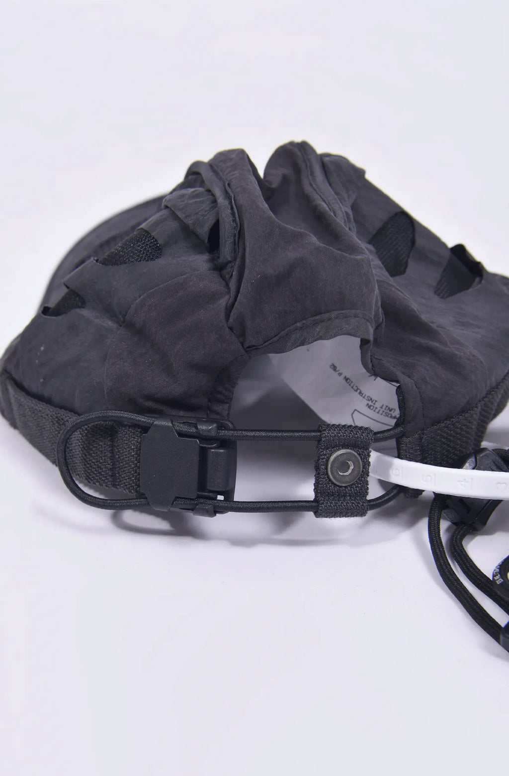 Hamcus, Mens Cap, Black, Grey, Mesh, Breathability Holes, Laser Cut, Fidlock Adjustment Buckle, Ventilated, Breathable, Adjusting Buckle Close-up. 