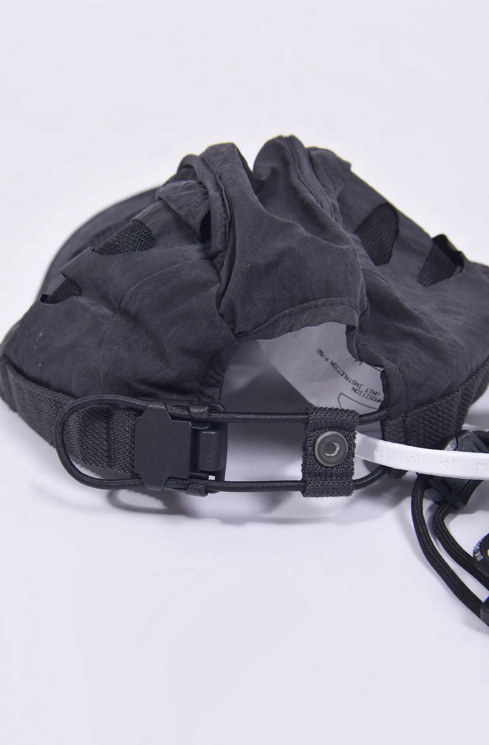 Hamcus, Mens Cap, Black, Grey, Mesh, Breathability Holes, Laser Cut, Fidlock Adjustment Buckle, Ventilated, Breathable, Adjusting Buckle Close-up. 