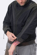 Hamcus, Mens Pullover, Black, Olive Green, Dual Long Zippers, Hybrid Garment, Convertible Garment, Long Sleeves, Adjustable Drawcord Cuffs, Ribbed Cuffs and Hem, Ventilation Design, Breathable, Modular, Multi-Functional, Front Portrait. 