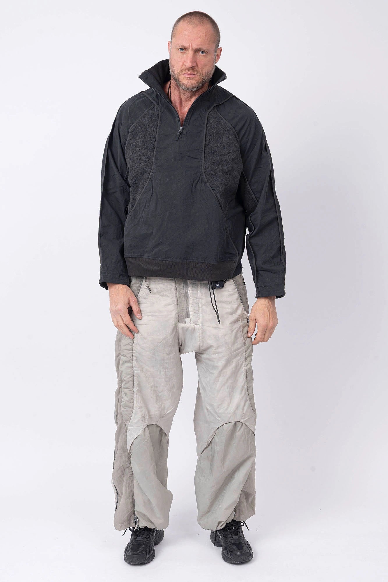Hamcus, Mens Pullover, Matte Black, Dark Grey, Dark Gray, Half-Zip, Quarter-Zip, Long Sleeves, Mock Neck, Symmetric Panel Design, Ribbed Hem and Sleeve Cuffs, Side Pockets, Elastic Drawcord Adjustable Cuffs with Cordstoppers, Ribbed Neck, Back LP World Print, Full Body Front Shot. 