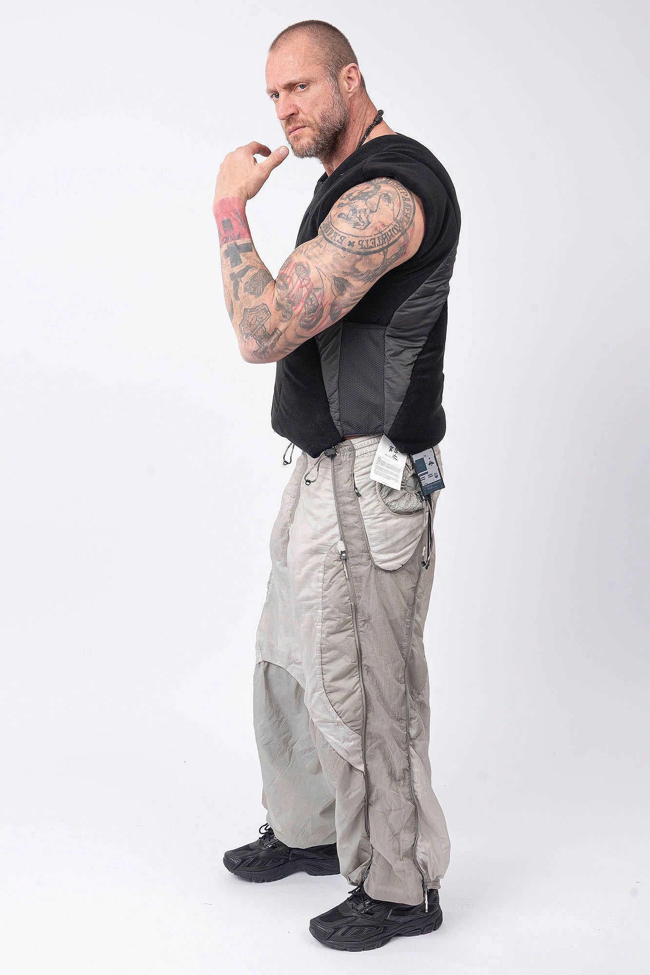 Hamcus, Mens Vest, Black, Fleece, Multi-Fabric Blend, Sleeveless, Full-Zip, Vislon Zipper, Plastic Zipper, Side Pockets, Breathable Back Mesh, Shoulder Zippers, Panel Construction, Patchwork Design, Centre Zip Closure, Ventilated, Full Body Side View. 