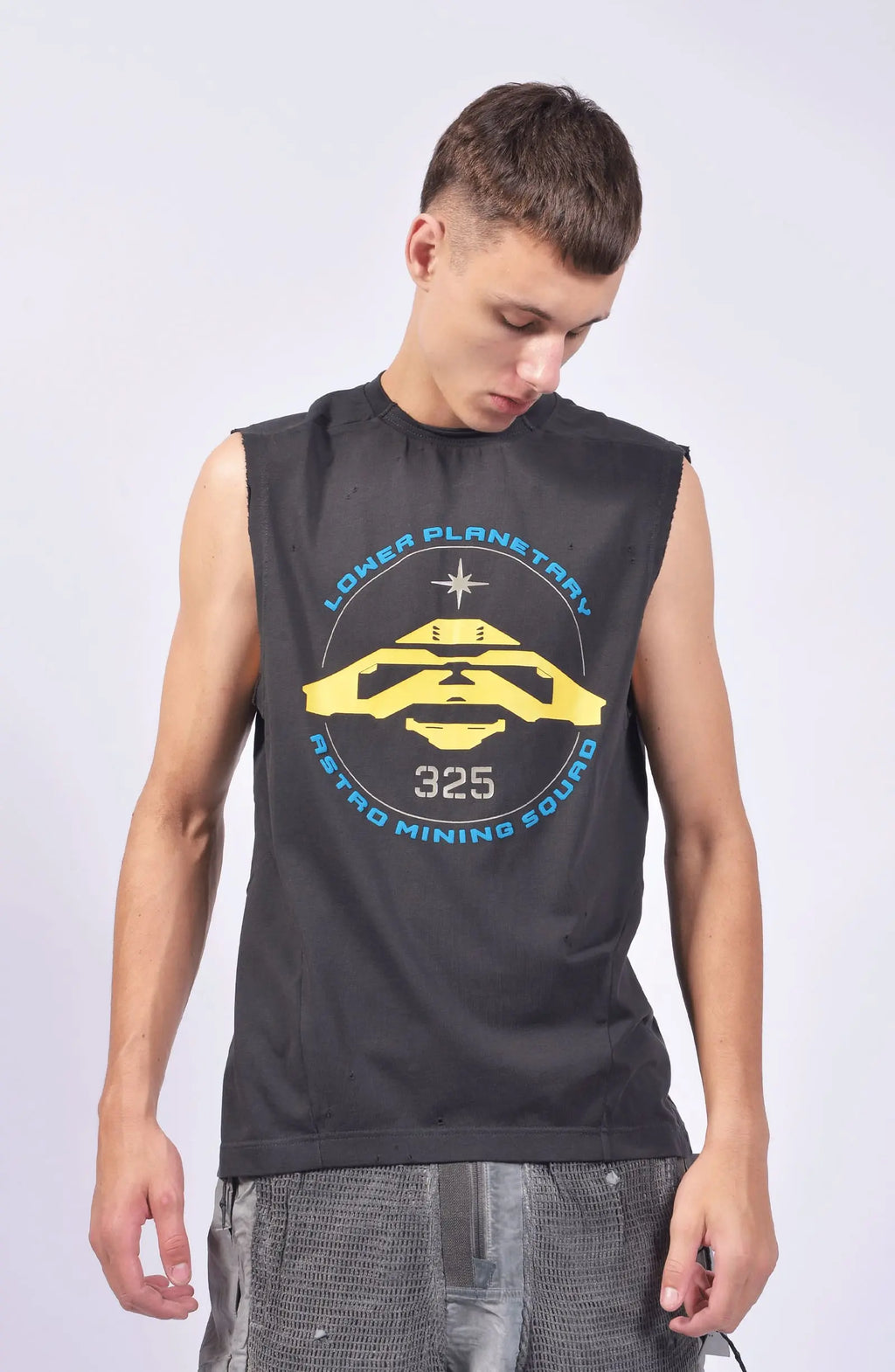 Hamcus, Mens Tank Top, Cloudy Black, Garment Dyed, No Sleeves, Dropped Shoulders, Loose Fit, Cotton, Distressed Fabric, Worn Look, LP World Print, Astro Mining Squad 325, Lower Planetary, Blue and Yellow, Front Portrait. 