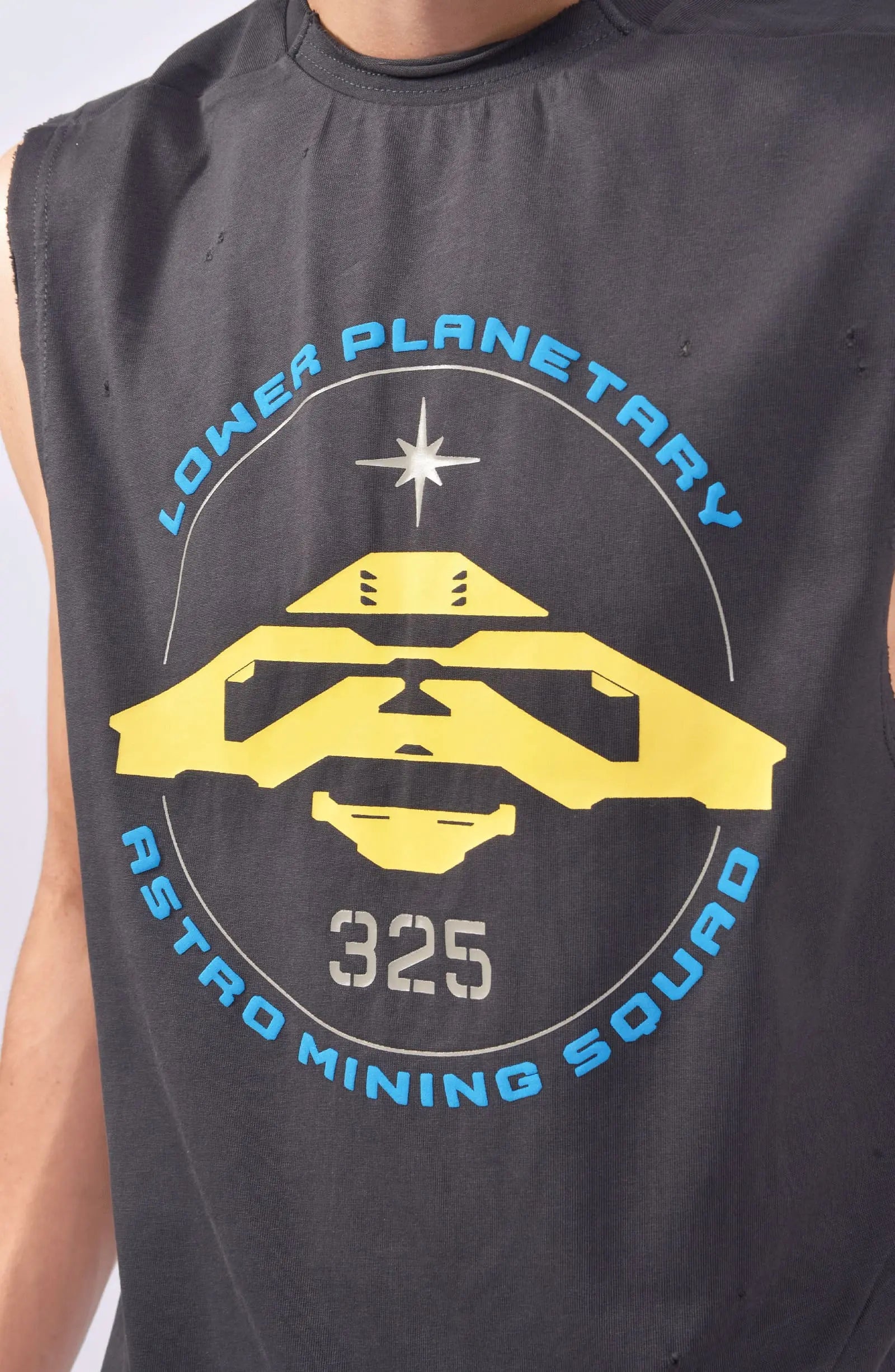 Hamcus, Mens Tank Top, Cloudy Black, Garment Dyed, No Sleeves, Dropped Shoulders, Loose Fit, Cotton, Distressed Fabric, Worn Look, LP World Print, Astro Mining Squad 325, Lower Planetary, Blue and Yellow, Front Print Close-up. 