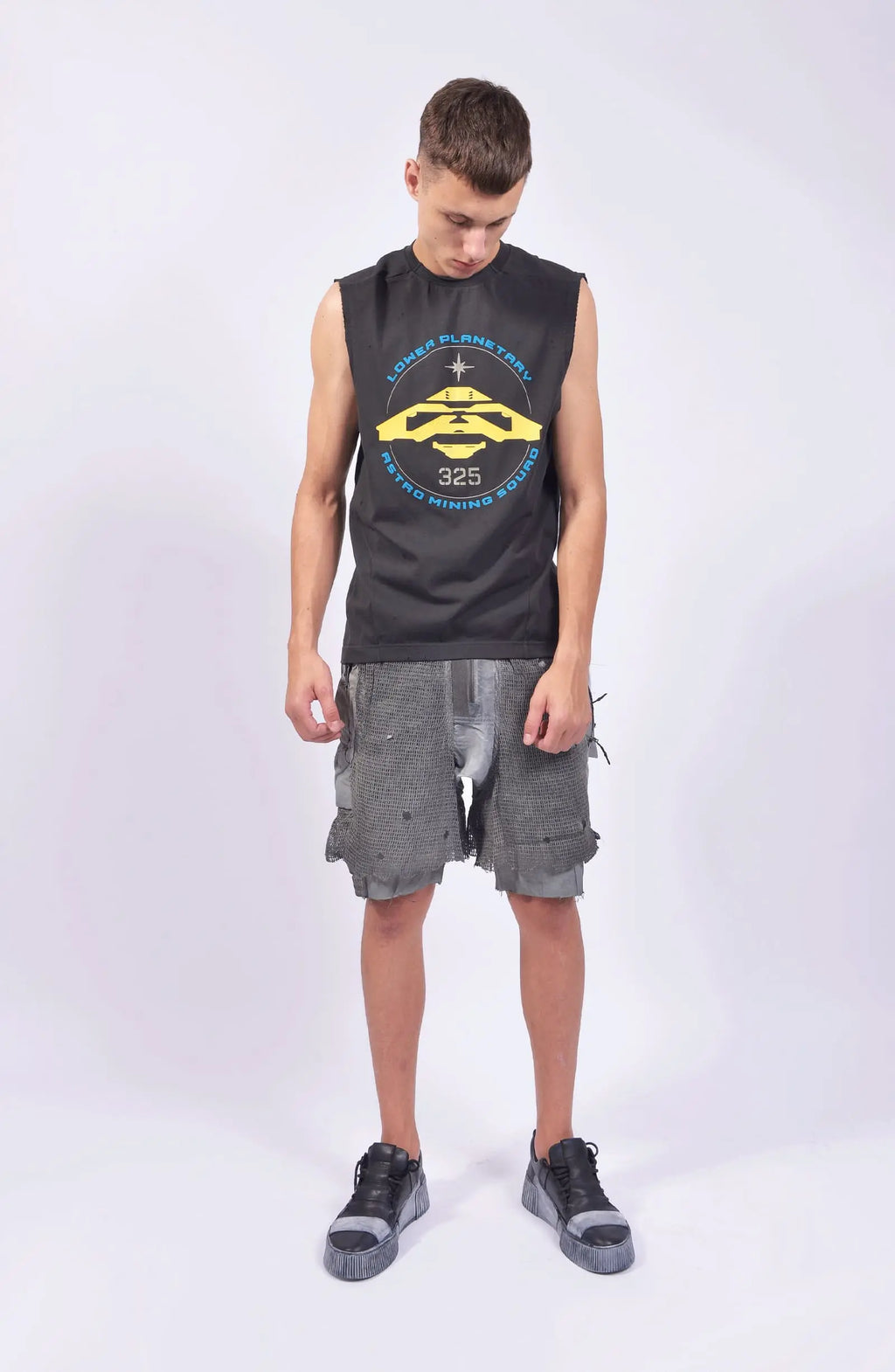 Hamcus, Mens Tank Top, Cloudy Black, Garment Dyed, No Sleeves, Dropped Shoulders, Loose Fit, Cotton, Distressed Fabric, Worn Look, LP World Print, Astro Mining Squad 325, Lower Planetary, Blue and Yellow, Full Body Front View. 