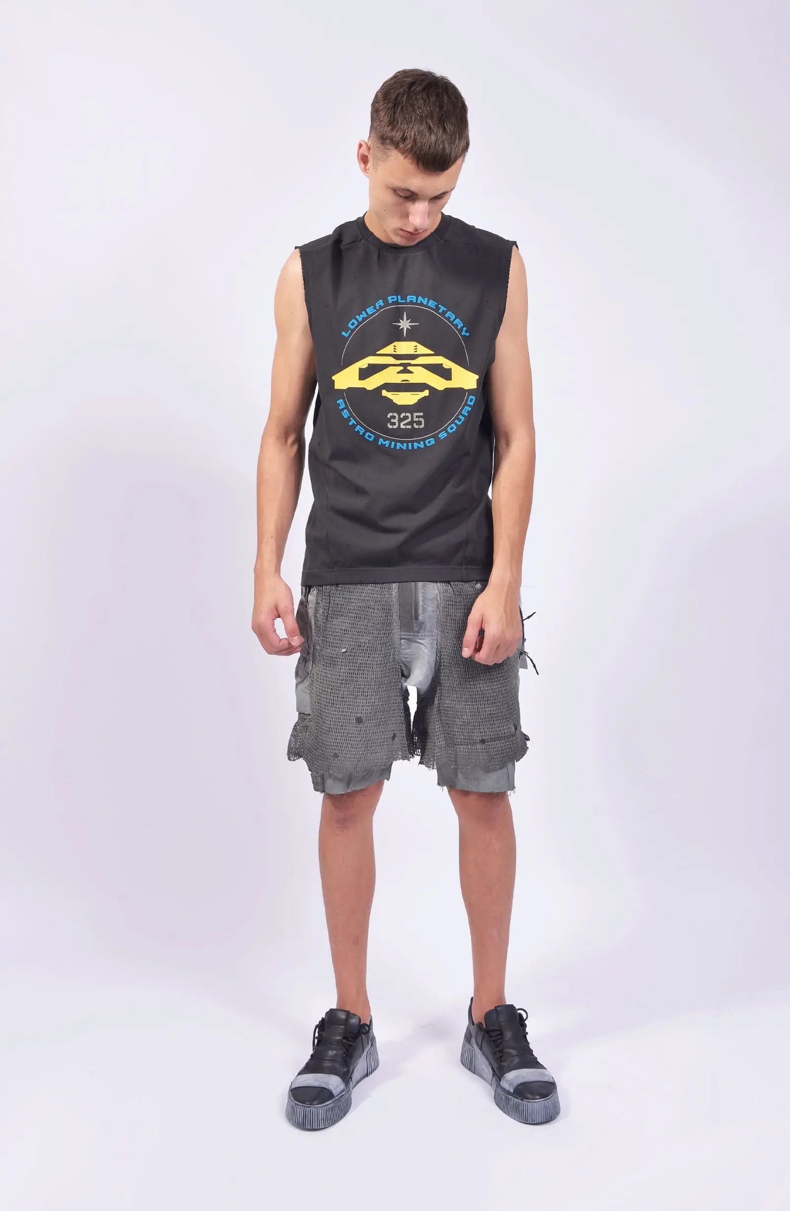 Hamcus, Mens Tank Top, Cloudy Black, Garment Dyed, No Sleeves, Dropped Shoulders, Loose Fit, Cotton, Distressed Fabric, Worn Look, LP World Print, Astro Mining Squad 325, Lower Planetary, Blue and Yellow, Full Body Front View. 