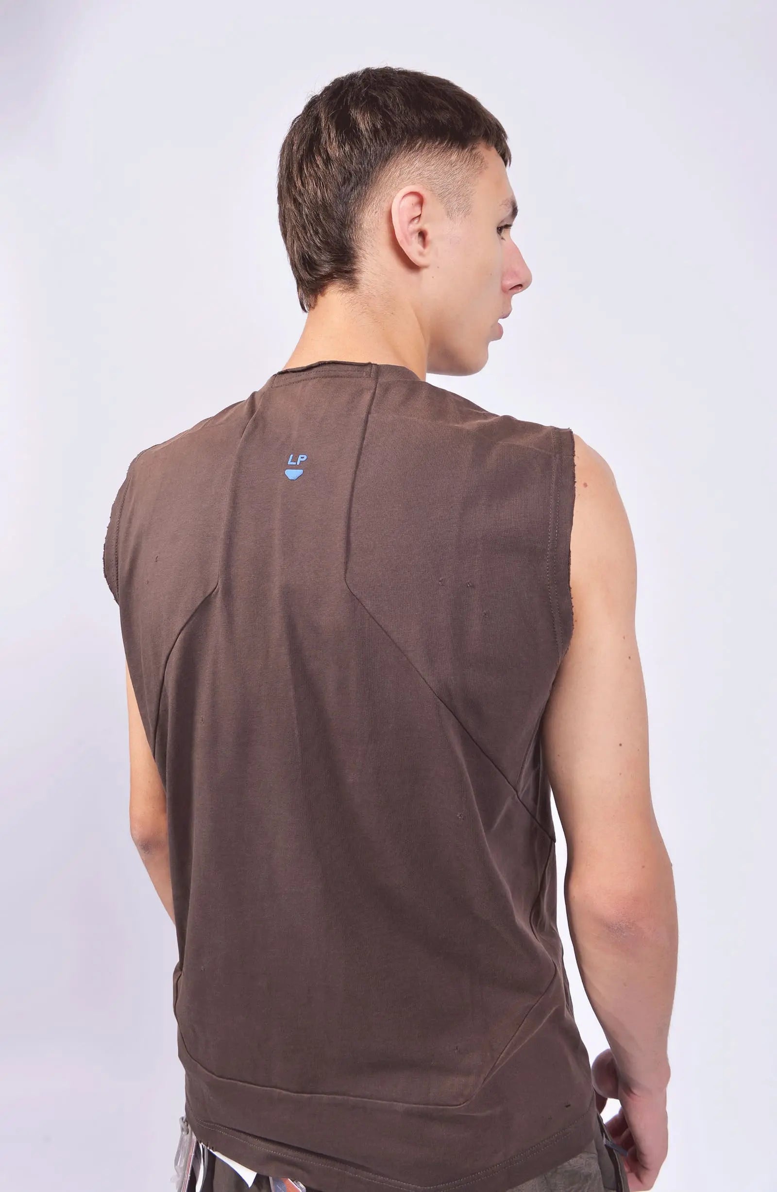 Hamcus, Mens Tank Top, Brown, Garment Dyed, No Sleeves, Dropped Shoulders, Loose Fit, Cotton, Distressed Fabric, Worn Look, LP World Print, Astro Mining Squad 325, Lower Planetary, Blue and Grey, Back 3/4 Portrait View. 