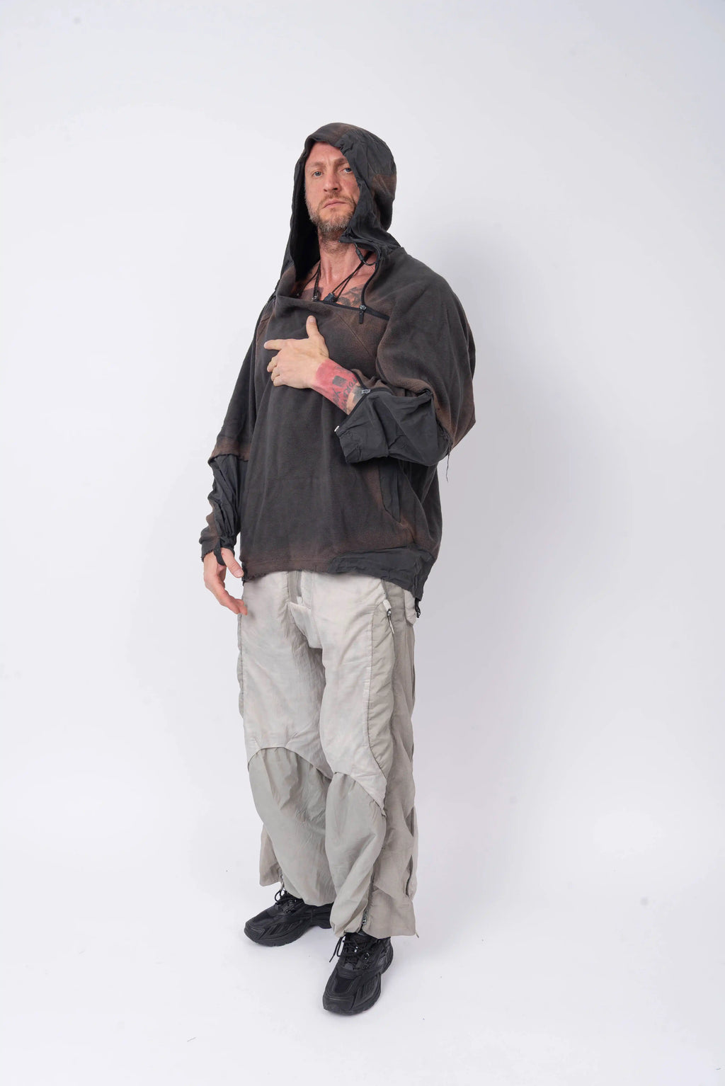 Hamcus, Mens Hoodie, Star-Scorched Black, Brown Details, Sun-Faded, Multiple Ventilation Zipper Openings, Hooded, Adjustable Drawcord Hood, Multi-Fabric Blend, LP World, Lower Planetary Universe, Tattoos, Raw-Cut Details, Elasticated Cuffs, Full Body Front View. 