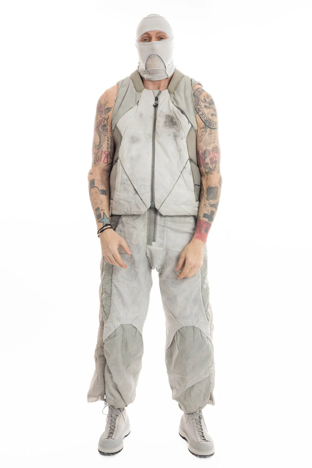 Hamcus, Mens Trousers, Light Grey, Dirt White, Straight Leg, Leg Zippers, Multi-Fabric, Translucent Inserts, Transparent, Zip Fly, Side Drawcord Pockets, Drawcord Elastic Waistband, Full Body Masked Vest Front View. 